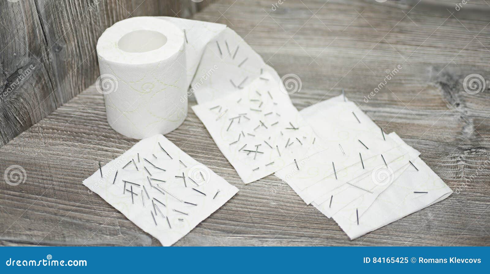 Toilet Paper with Nails in it. Stock Image Image of humor, restroom