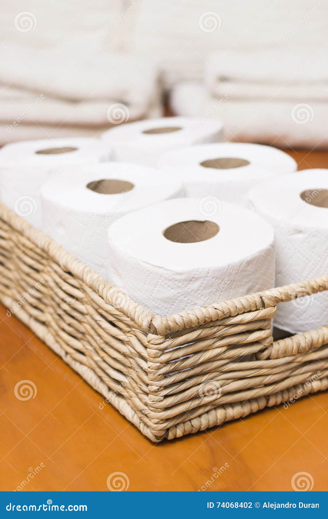 Toilet paper rolls basket stock photo. Image of closeup 74068402