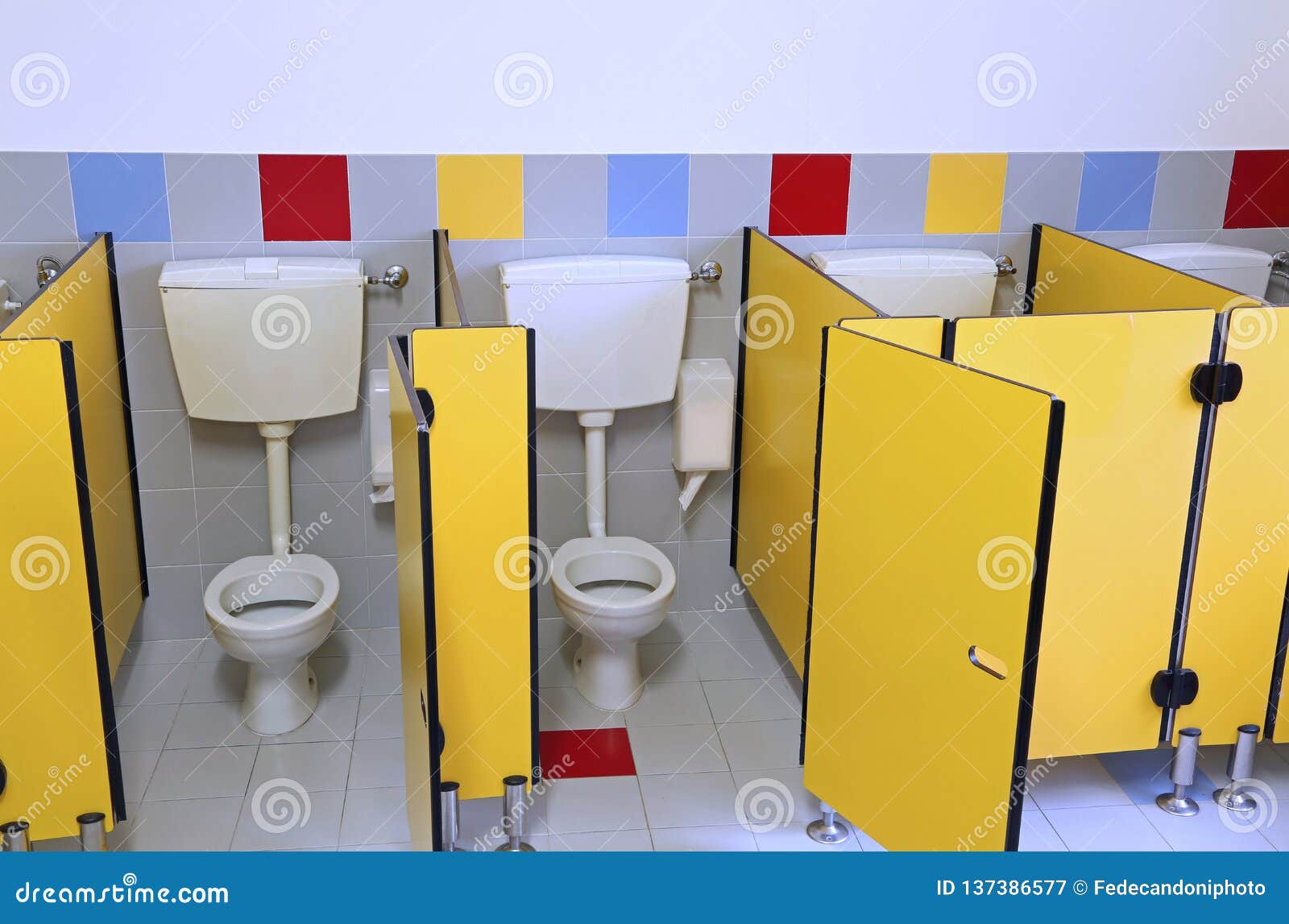 Toilets of a Kindergarten with Yellow Doors Stock Image Image of