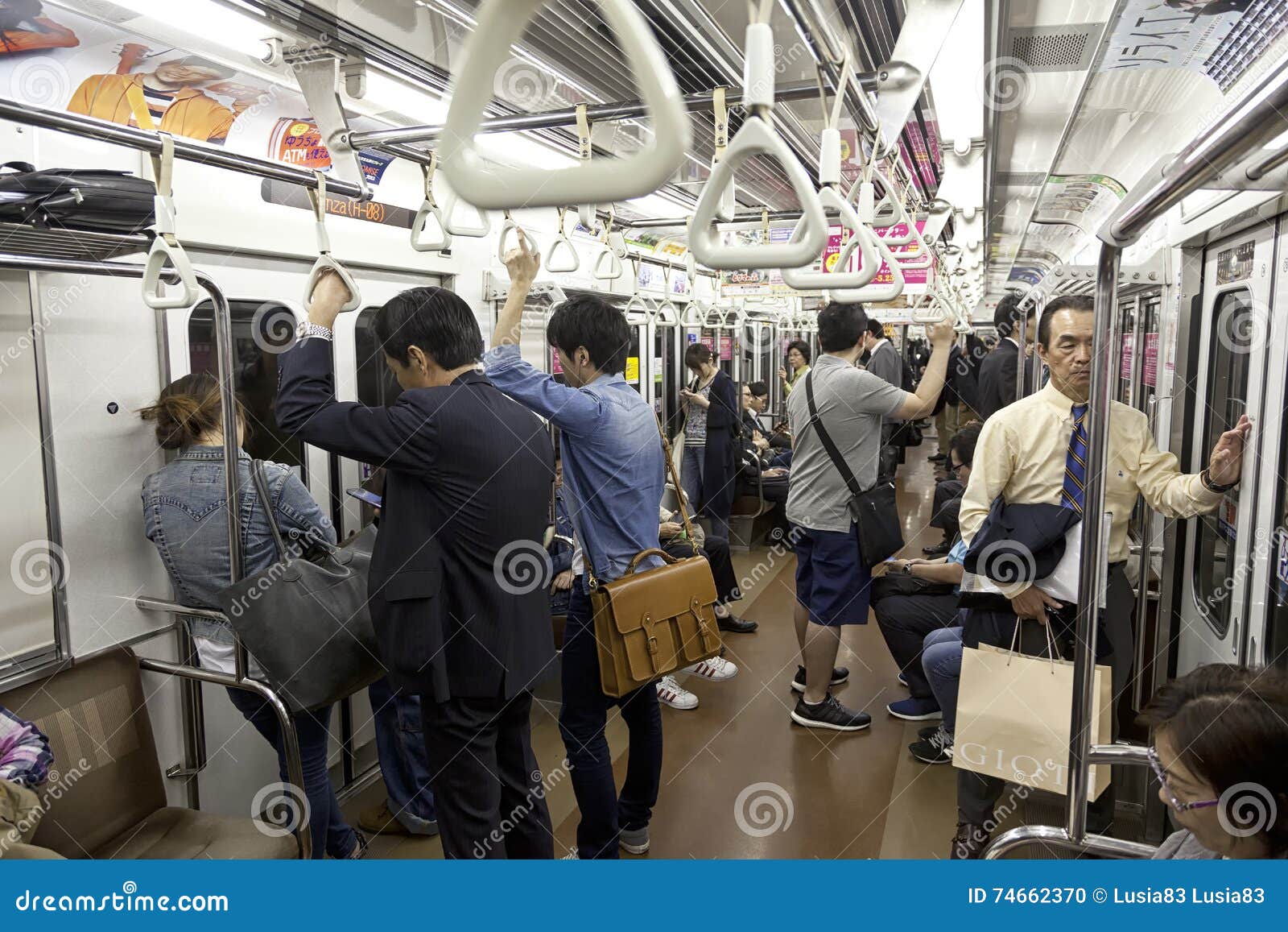 TOKYO- CIRCA MAY, 2016: Passengers Traveling by Tokyo Metro. Business  People Commuting To Work by Public Transport in Rush Hour. Editorial Image  - Image of rail, modern: 74662370