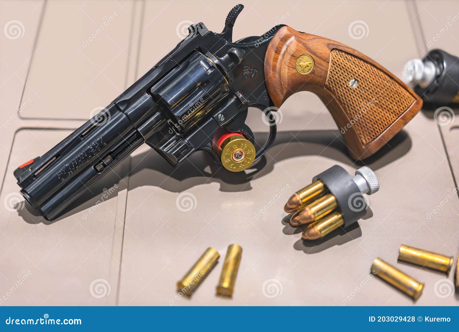 Replica of a Black Revolver Colt Python 357 Magnum with Replica of a Black Revolver Colt Python 357 Magnum with