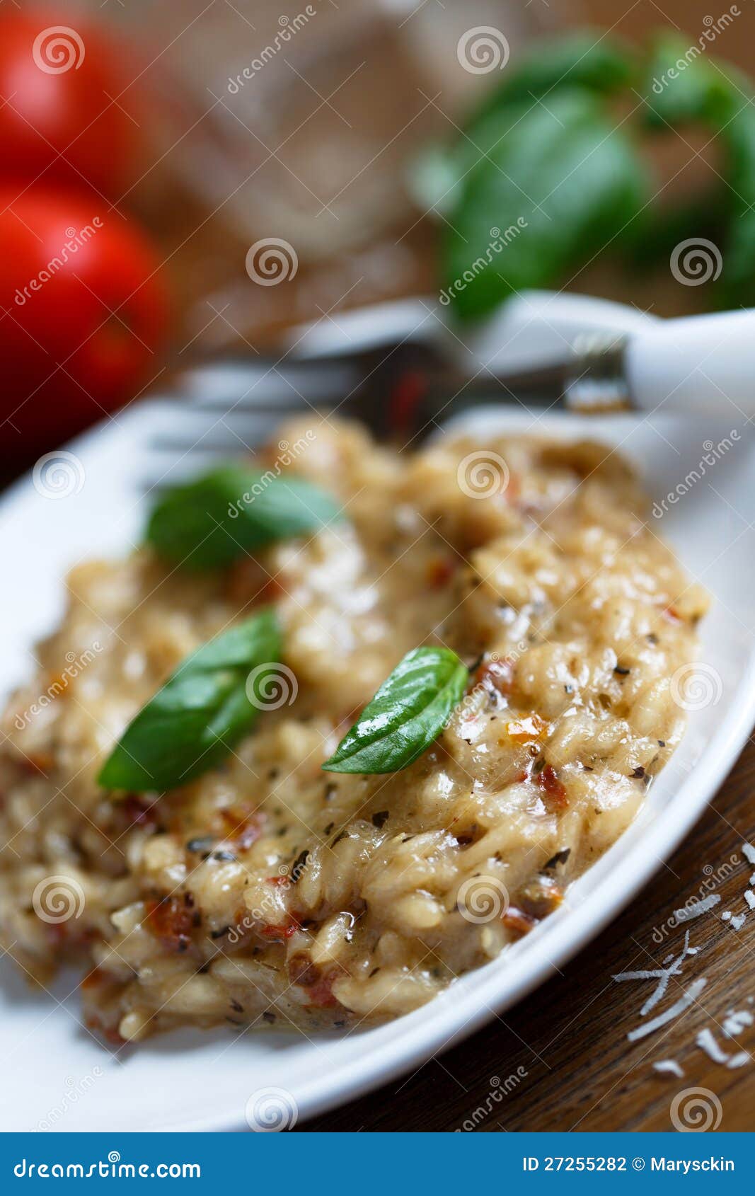 Tomato and basil risotto with parmesan cheese