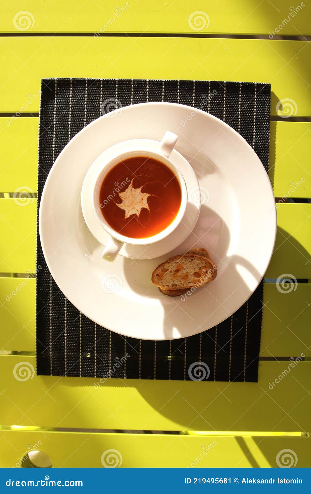 Tomato Juice in a Cup and Bread. Table Setting in a Restaurant. Stock
