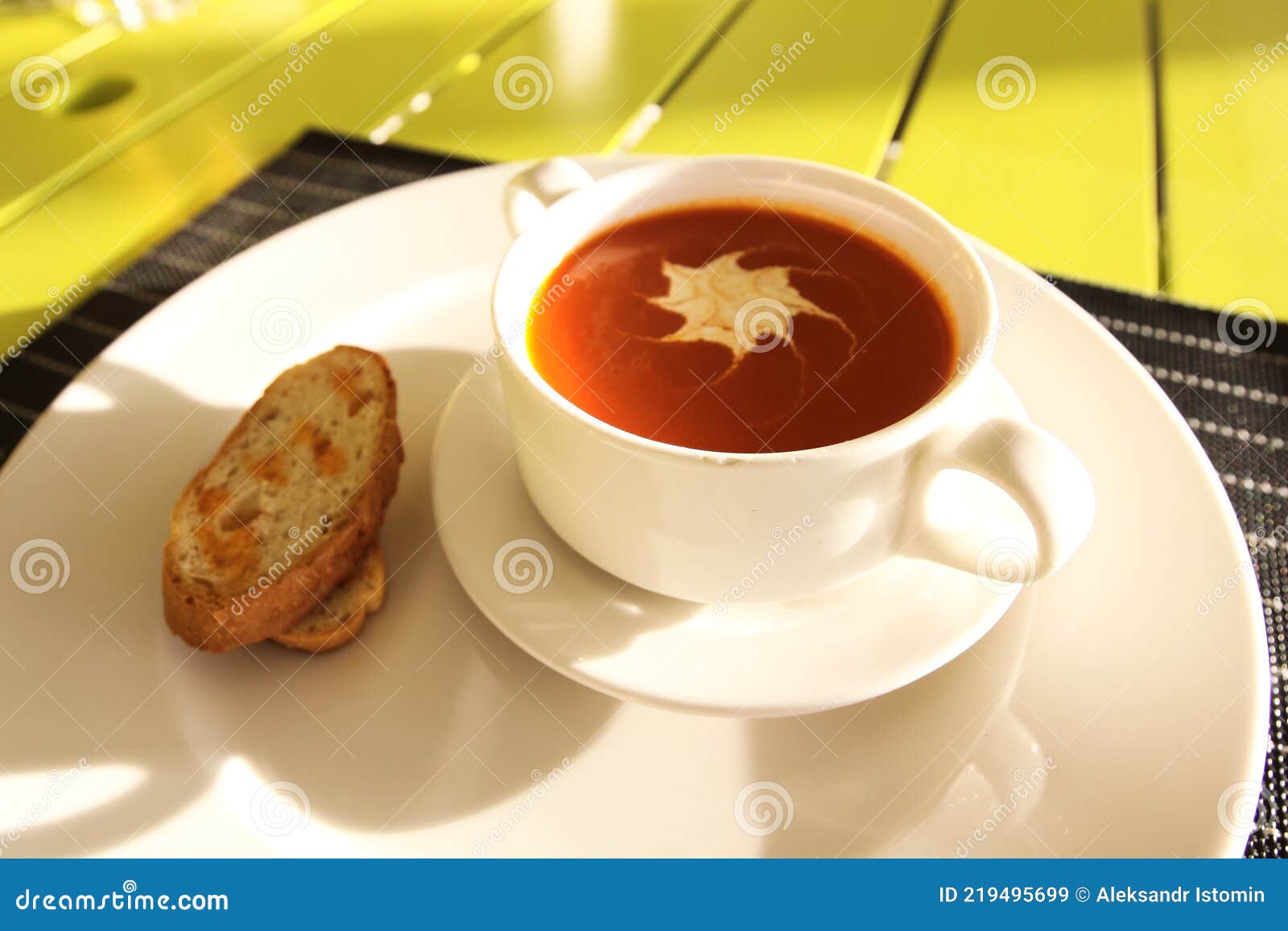 Tomato Juice in a Cup and Bread. Table Setting in a Restaurant. Stock