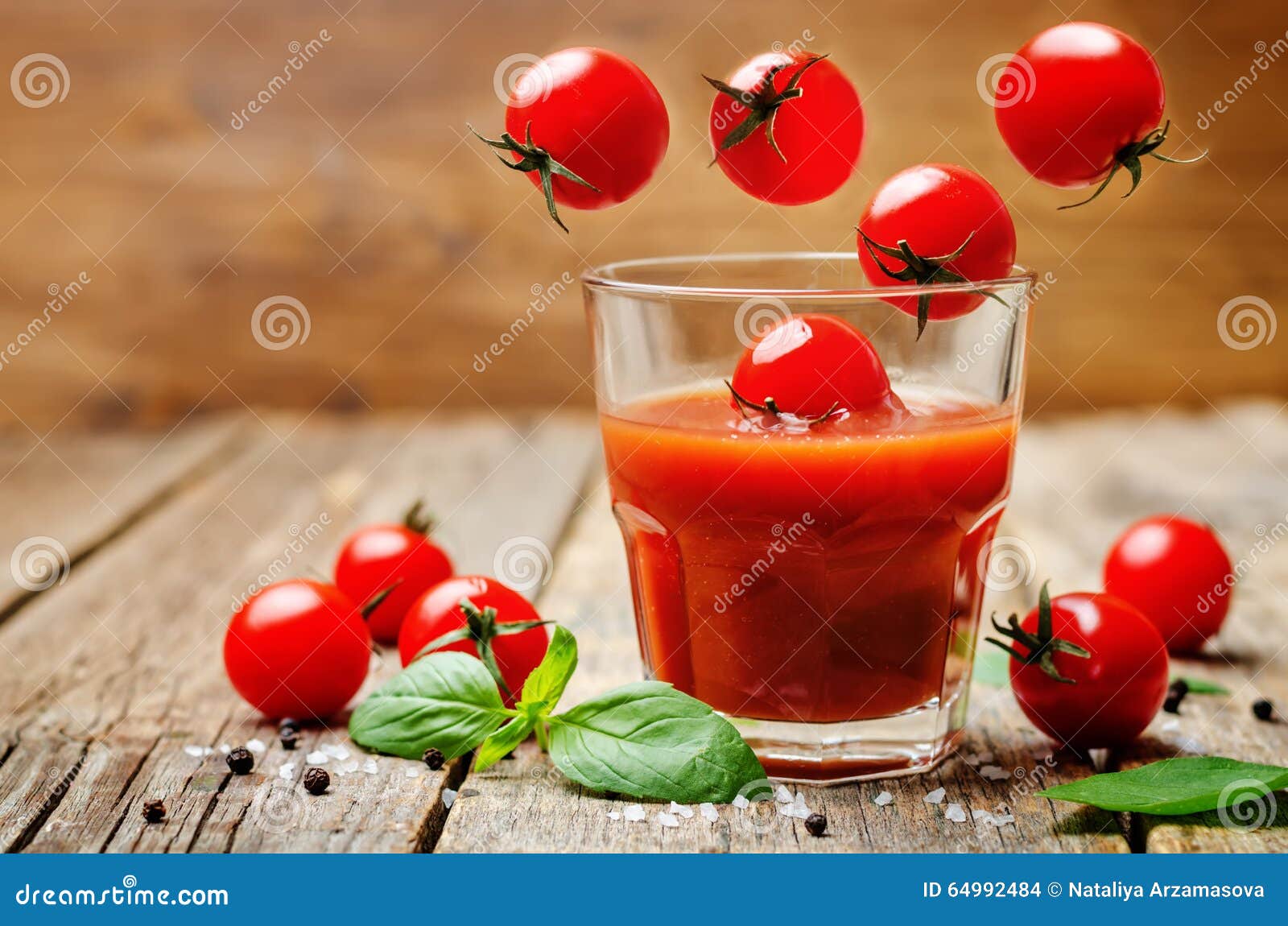 Tomato juice with tomatoes stock photo. Image of juice 64992484