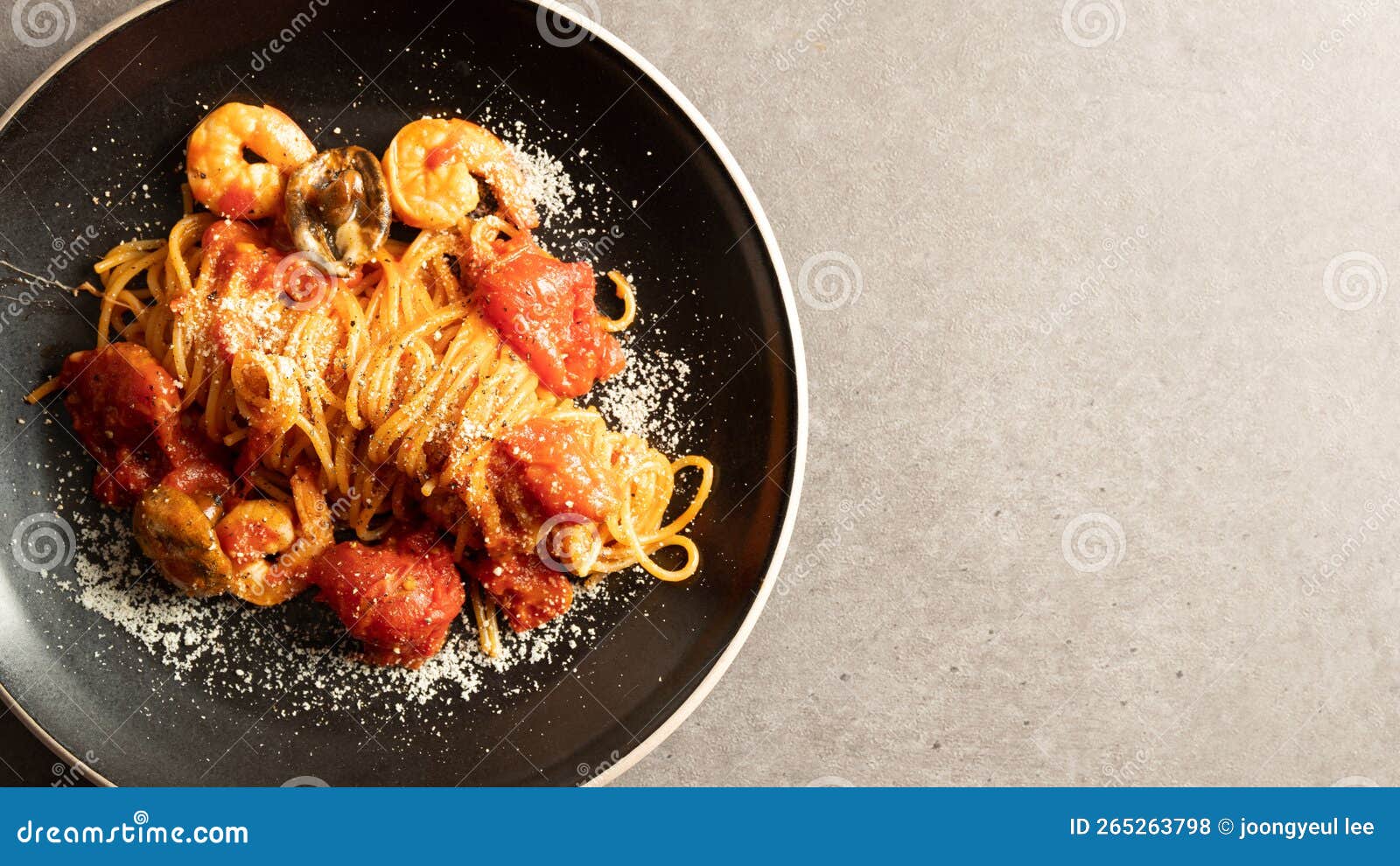 Tomato Shrimp Pasta on a Plate Stock Photo - Image of green, cheese