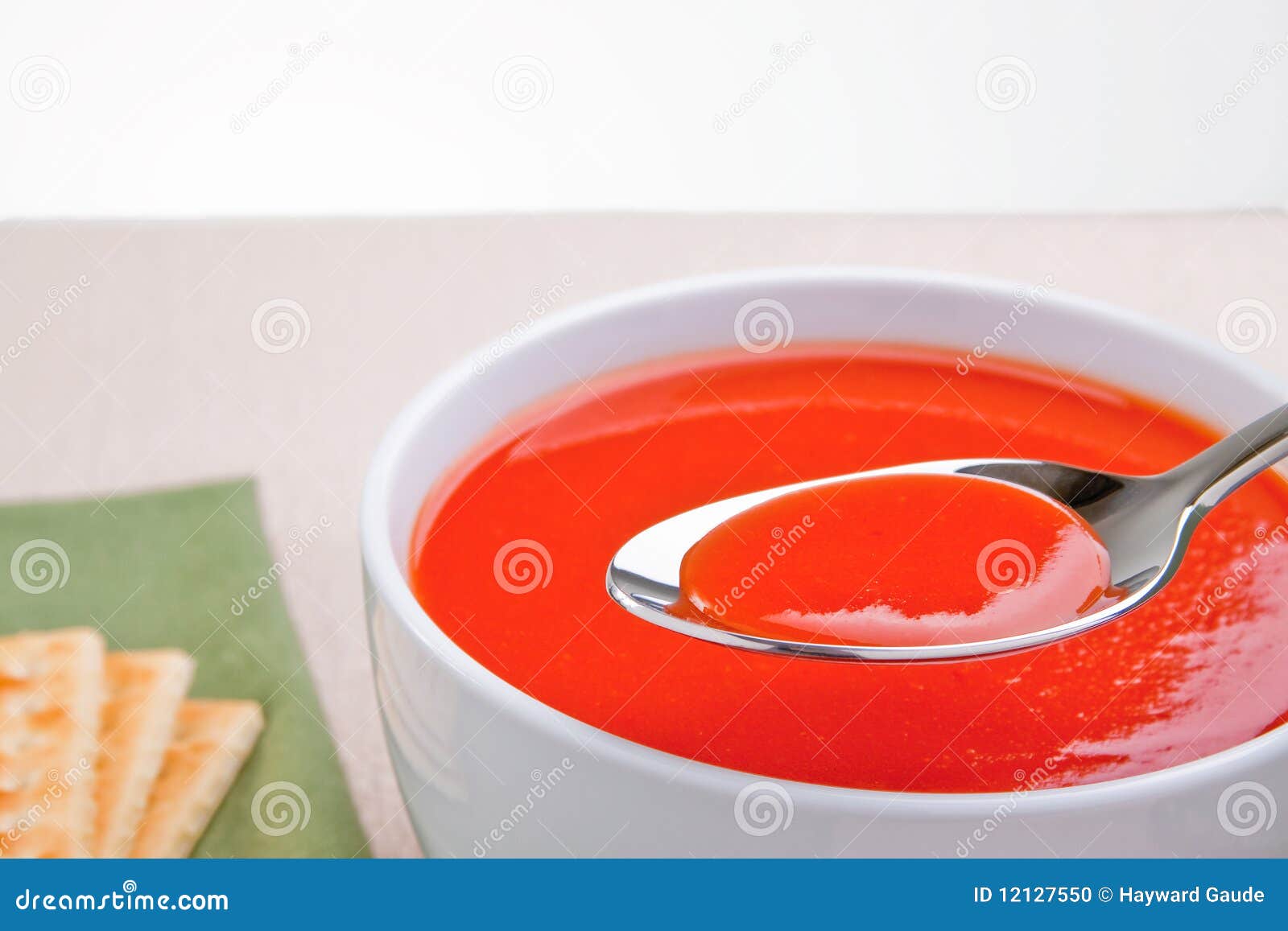 Tomato soup on spoon stock photo. Image of dish, delicious 12127550