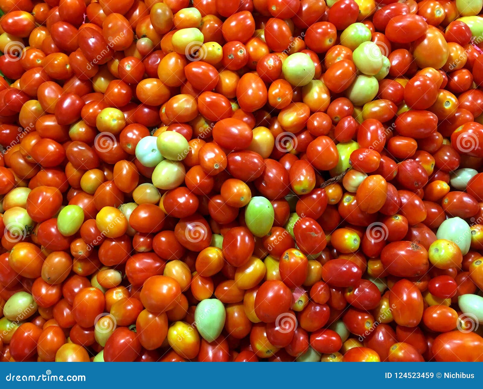 Tomatoes in bulk stacked stock image. Image of form 124523459