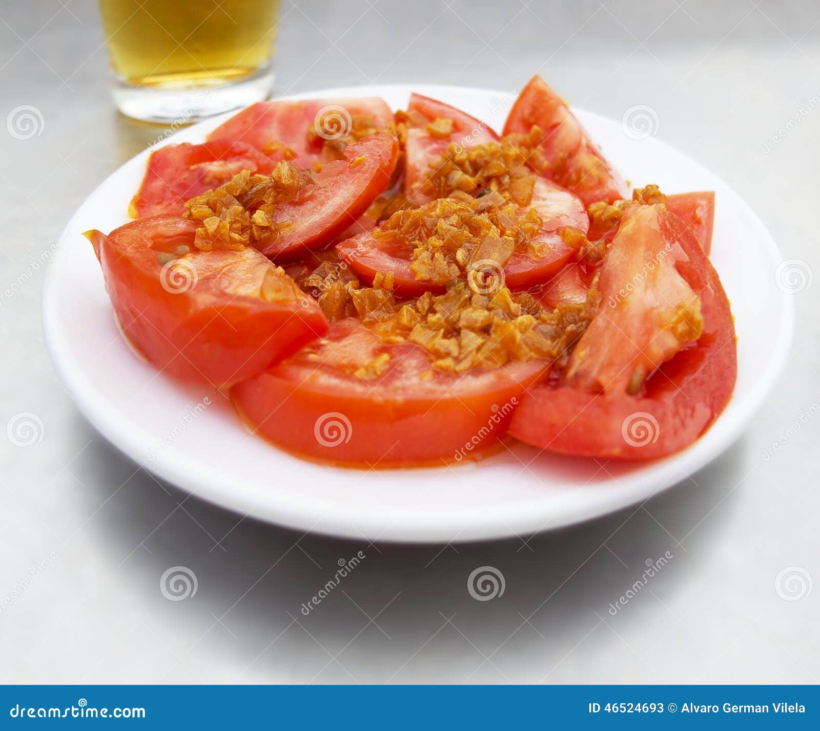 tomatoes with garlic tapa. tapa de tomate al ajillo