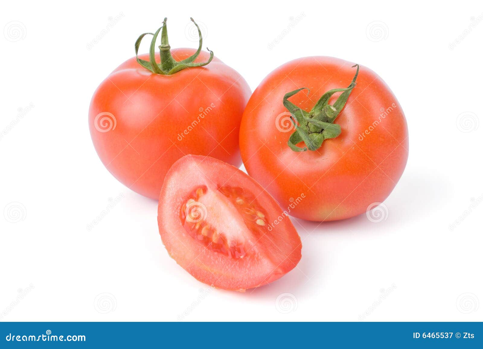 Ripe tomatoes isolated on a white background with one cut in a quarter