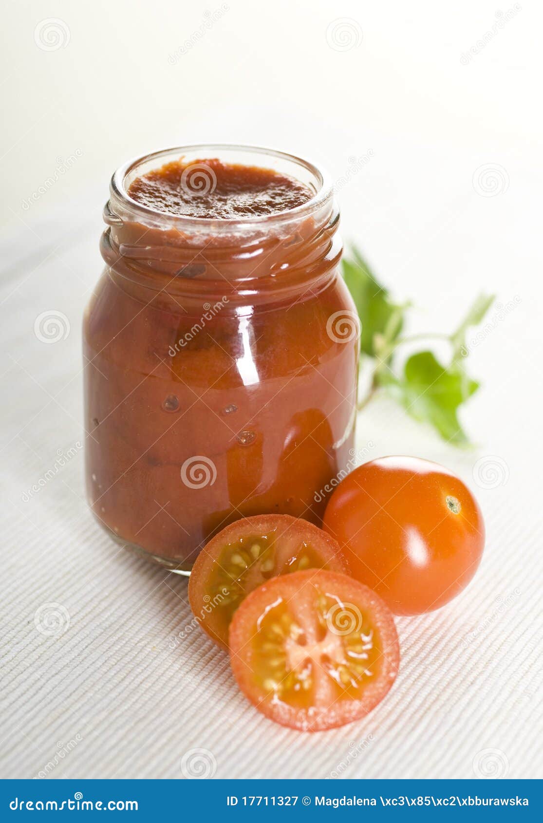 Tomatoes and ketchup stock image. Image of glass, background 17711327
