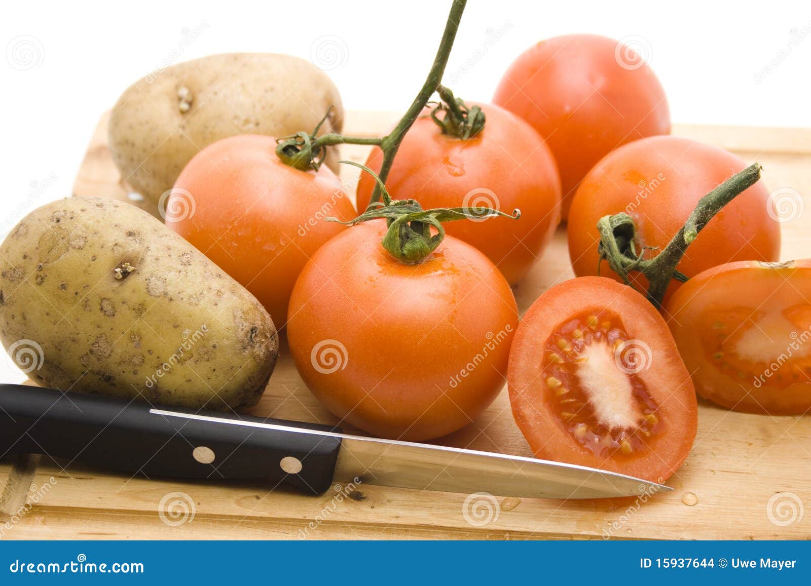 Tomatoes with knife stock photo. Image of knife, isolated 15937644