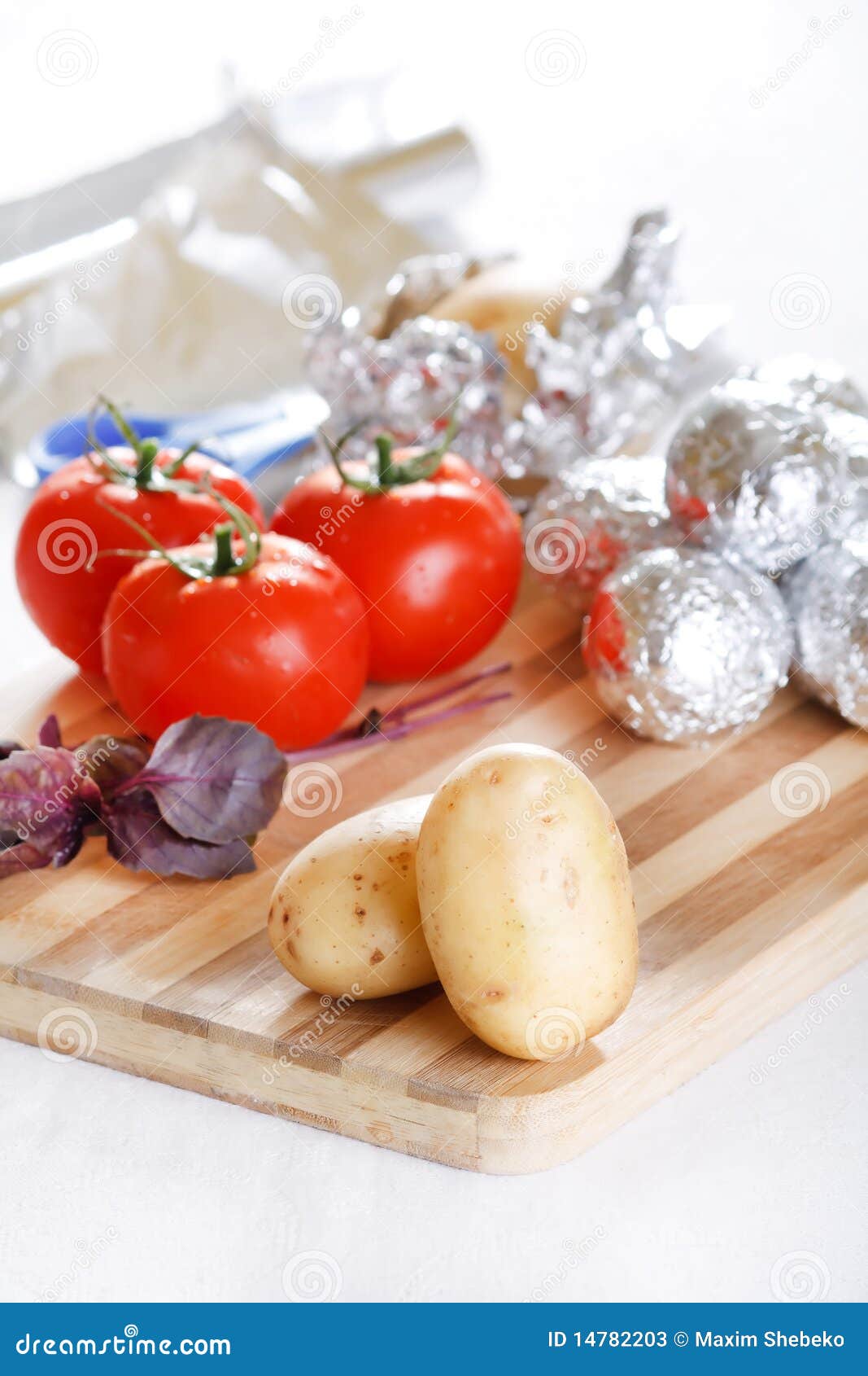 Tomatoes with potatoes stock image. Image of cholesterol 14782203