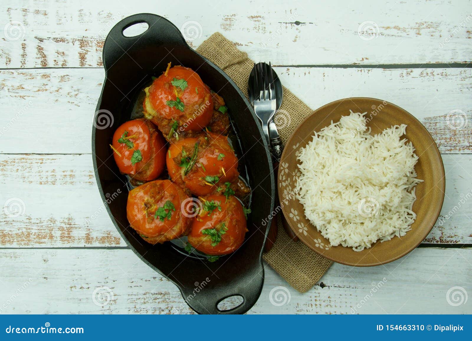 Tomatoes Stuffed with a Spicy Mixture of Mashed Potatoes in an Indian