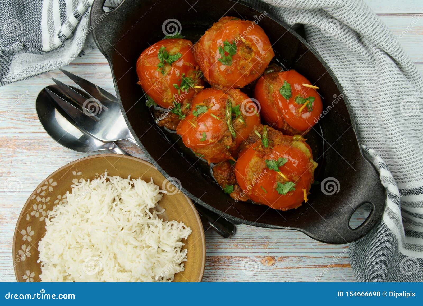 Tomatoes Stuffed with a Spicy Mixture of Mashed Potatoes in an Indian