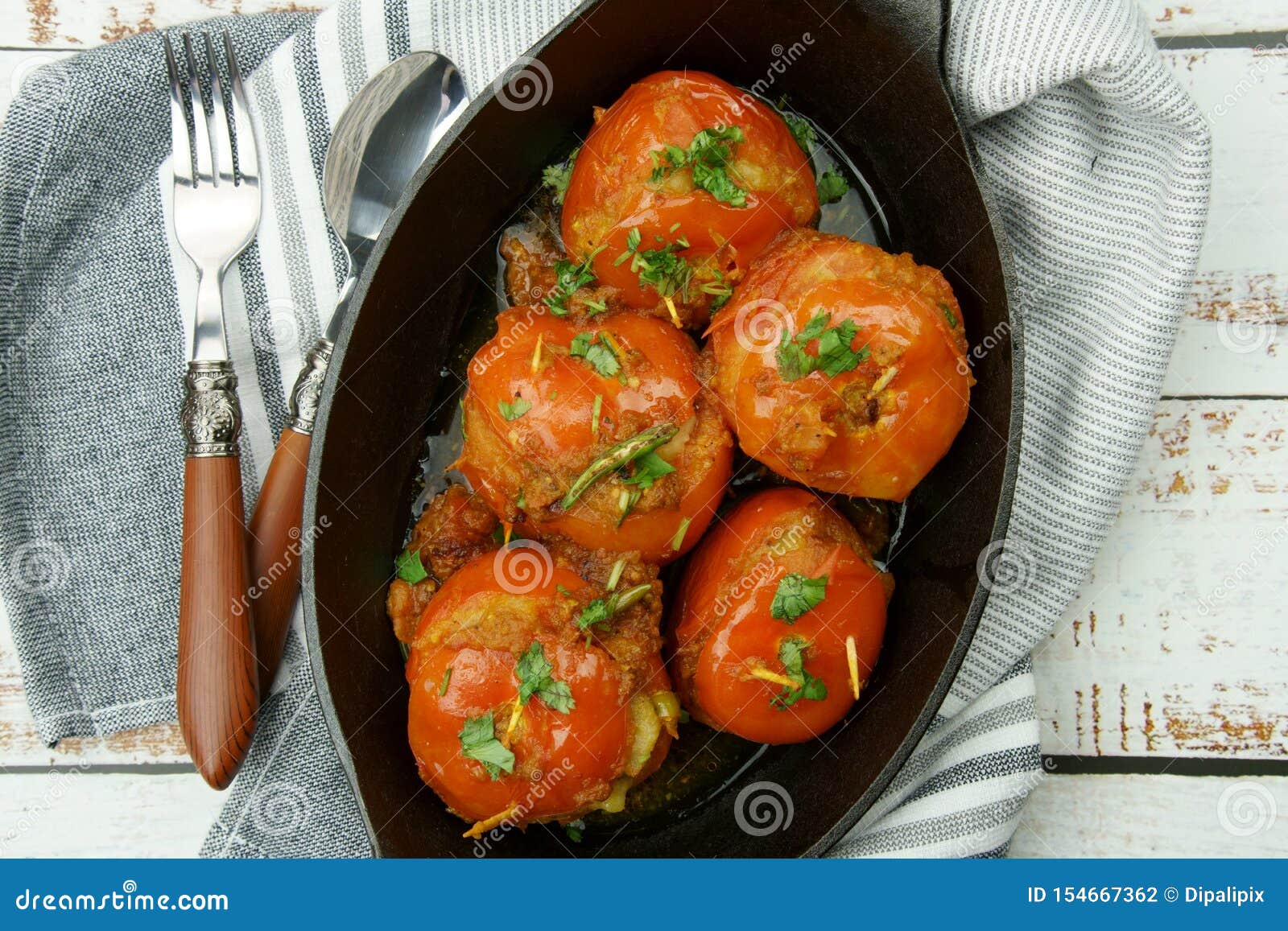 Tomatoes Stuffed with a Spicy Mixture of Mashed Potatoes in an Indian