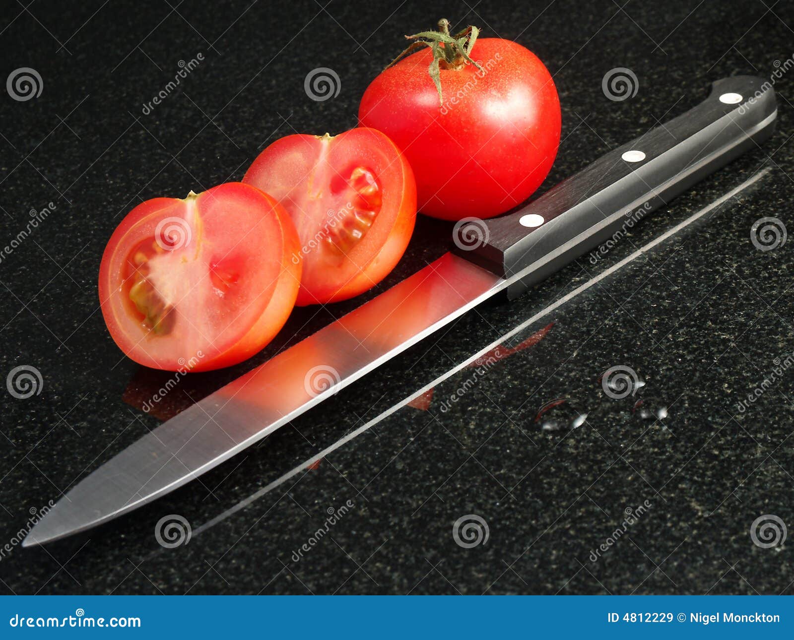 Tomatoes with Vegetable Knife Stock Image Image of black, organic