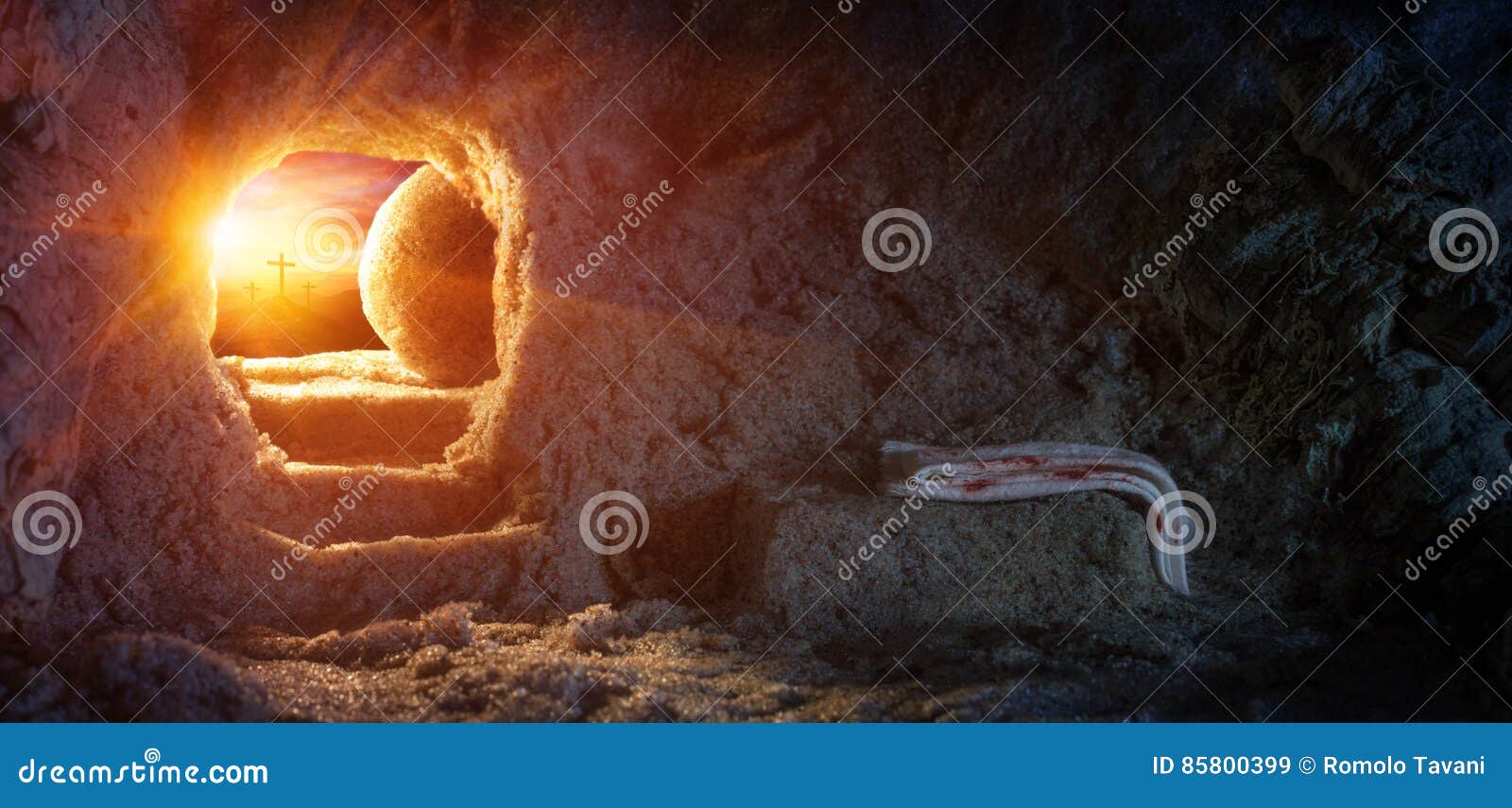 tomb empty with shroud and crucifixion at sunrise