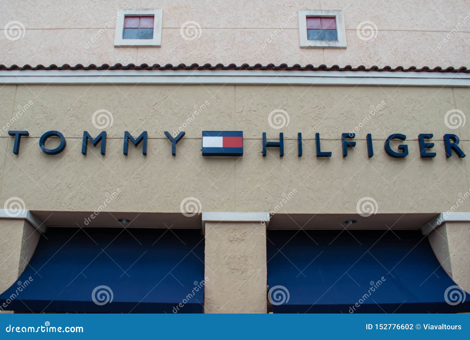 Tommy Hilfiger Sign and Logo at Premium Outlet in International Drive Area  . Editorial Photography - Image of concept, interior: 152776602