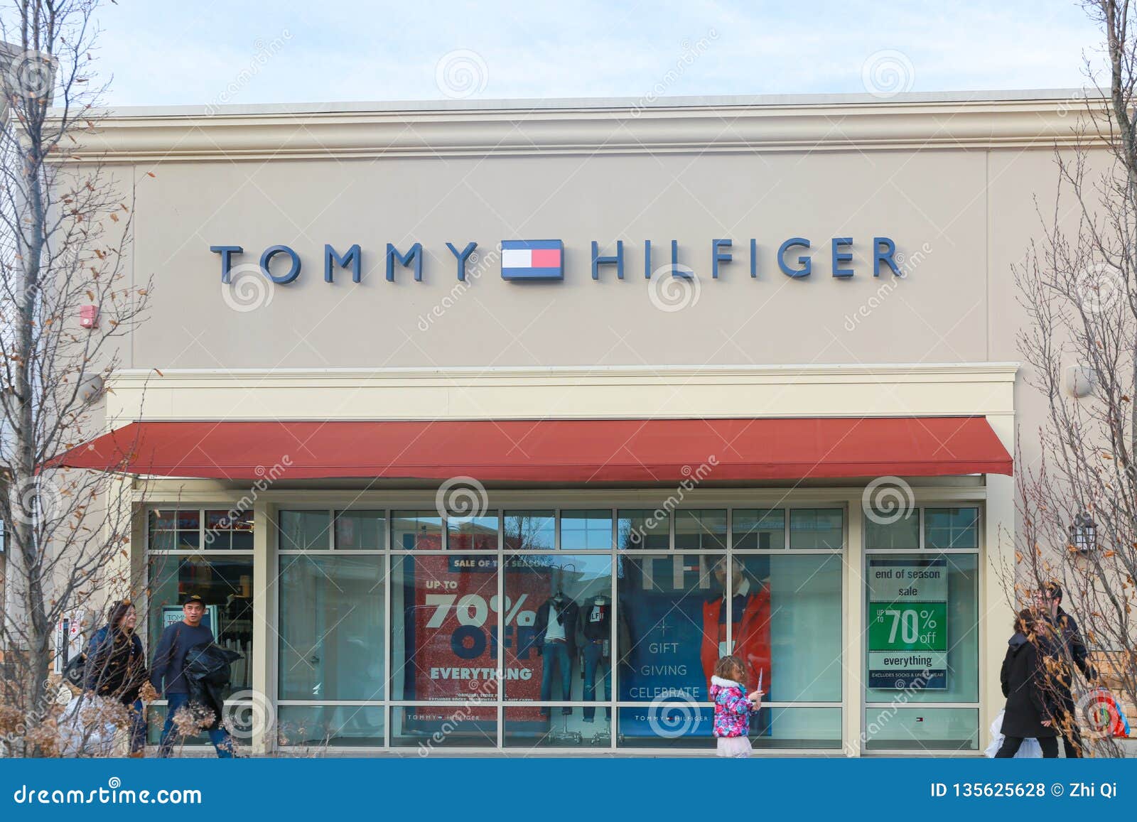 Hilfiger sign. editorial photo. Image of clothing - 135625628