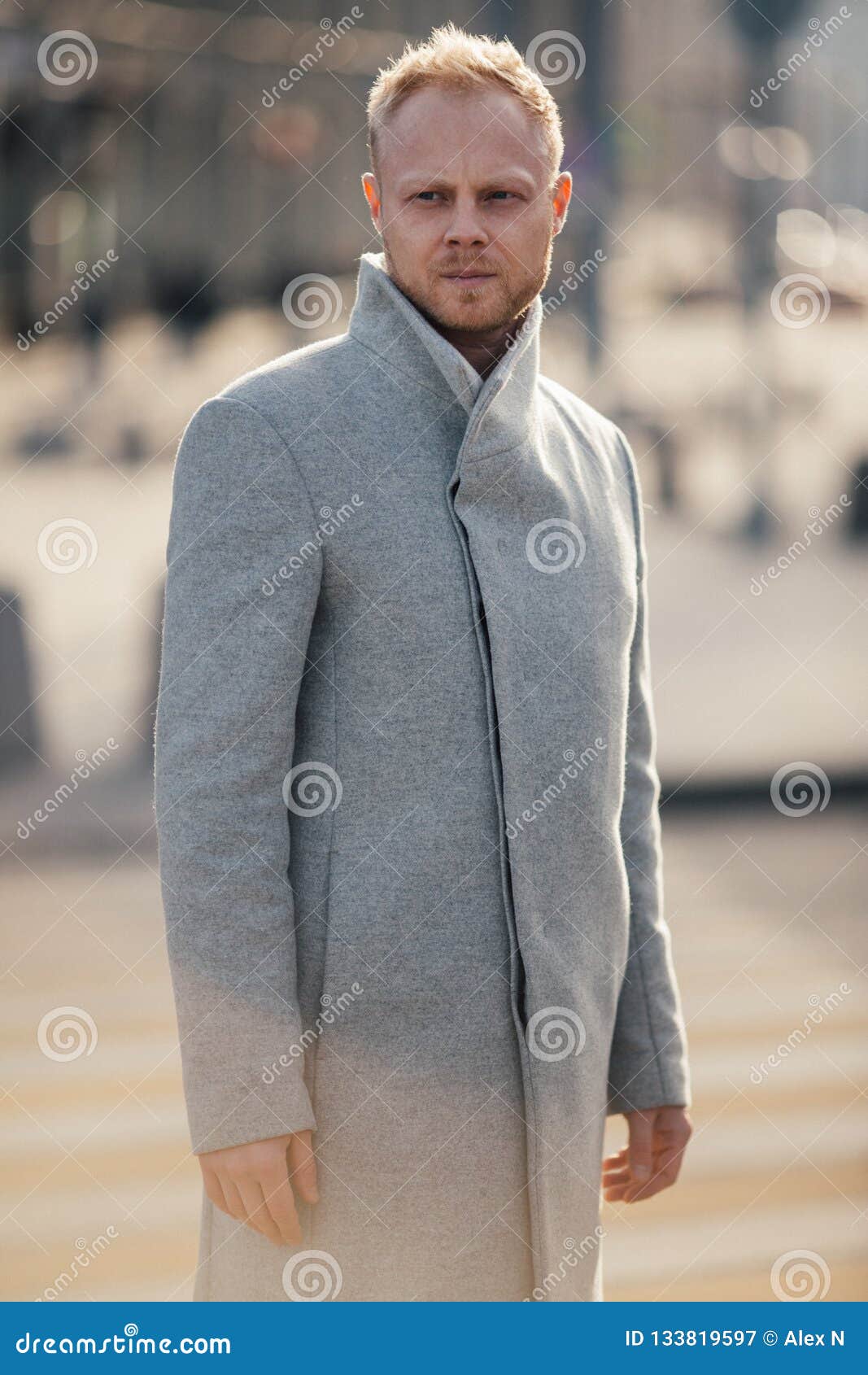 Toned Photo of Man in Gray Coat Walking in City Stock Image - Image of ...