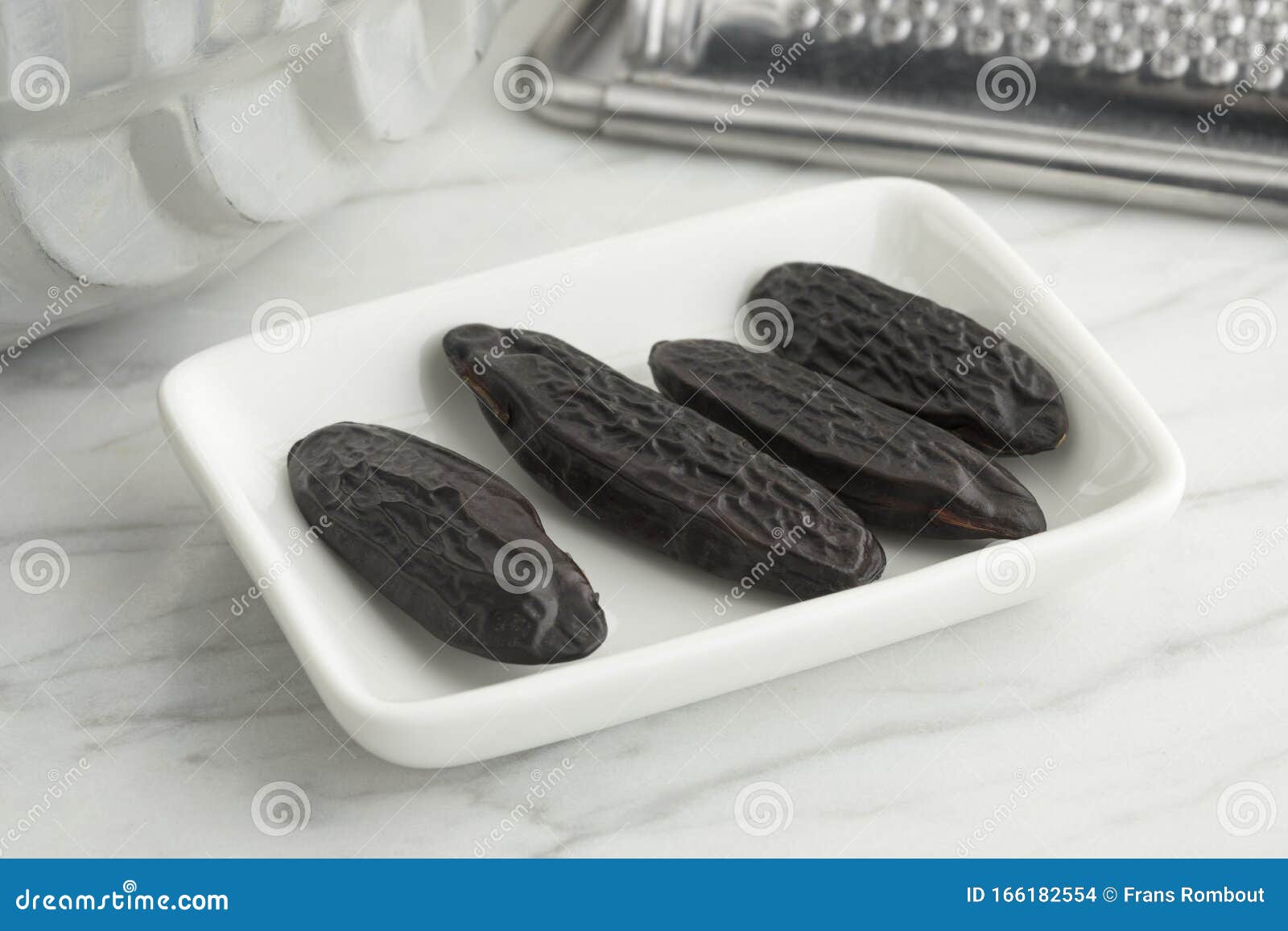 Tonka beans on a dish stock photo. Image of black, gourmet 166182554