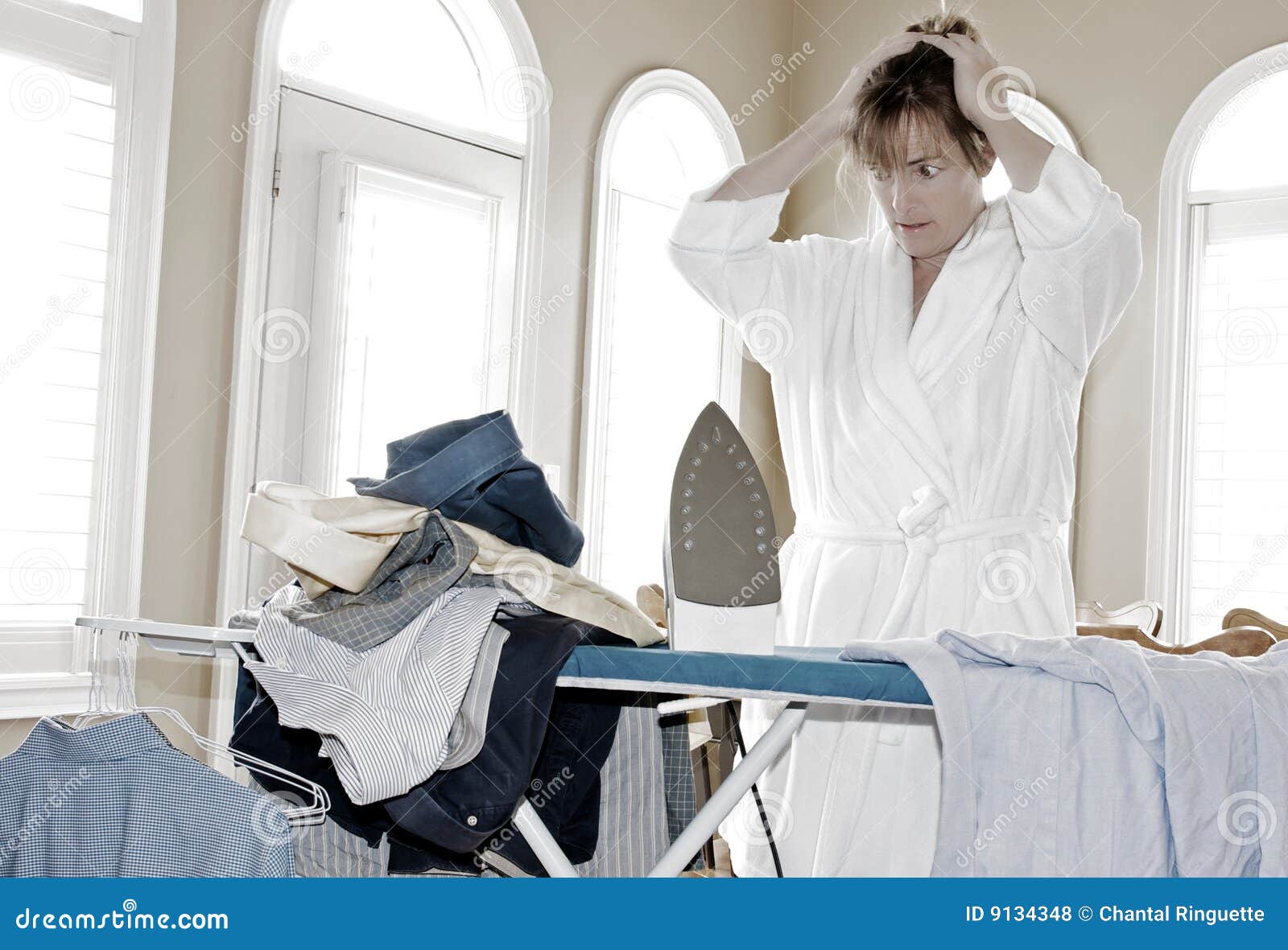 Too much ironing to do stock photo. Image of expression 9134348