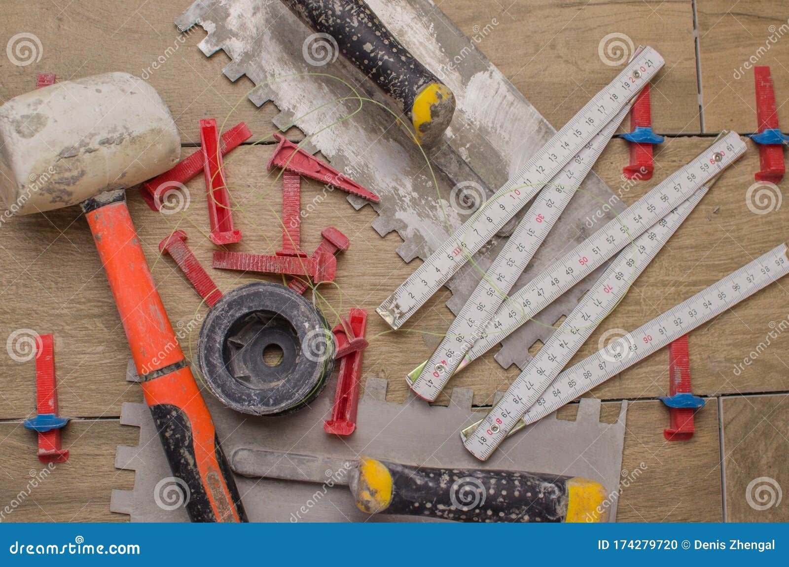 https://thumbs.dreamstime.com/z/tool-laying-ceramic-tiles-form-tree-trowel-toothed-spatula-fishing-line-ruler-rubber-hammer-professional-174279720.jpg