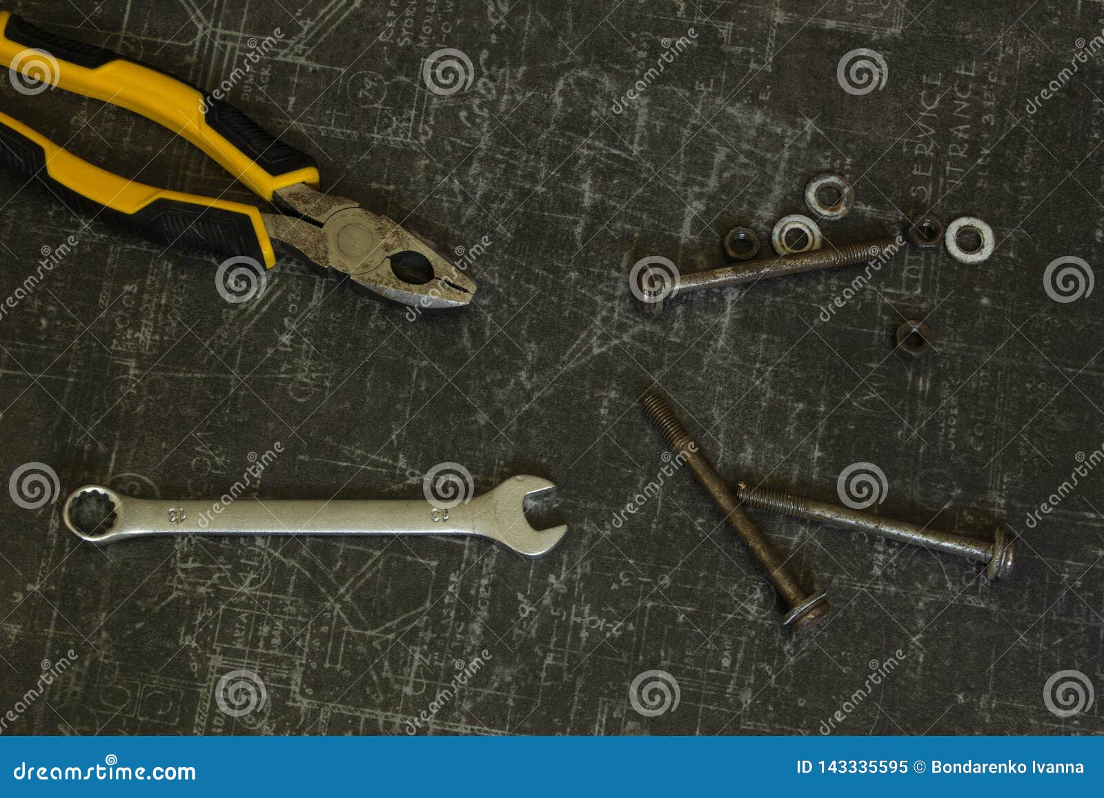 Tool Set of Pliers, Wrenches, Bolts and Nuts on Abstract Grey Surface Stock Image Image of