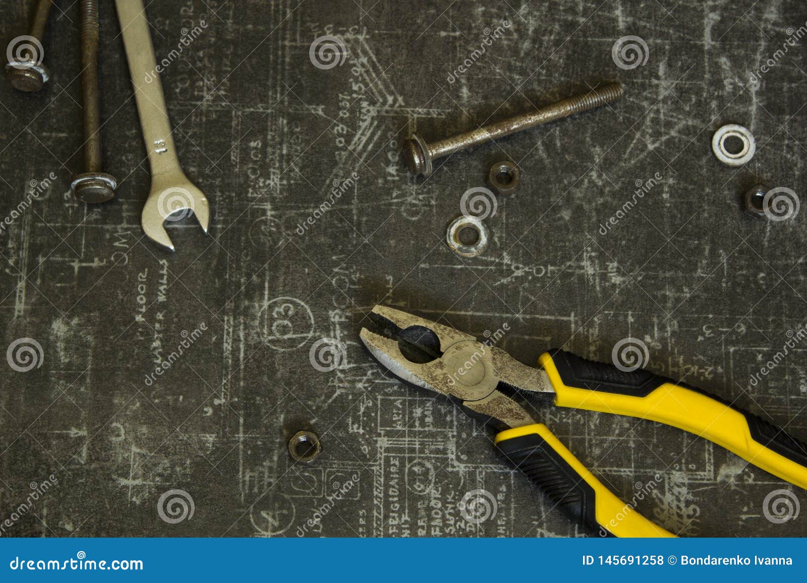 Tool Set of Pliers, Wrenches, Bolts and Nuts on Abstract Grey Surface Stock Photo Image of