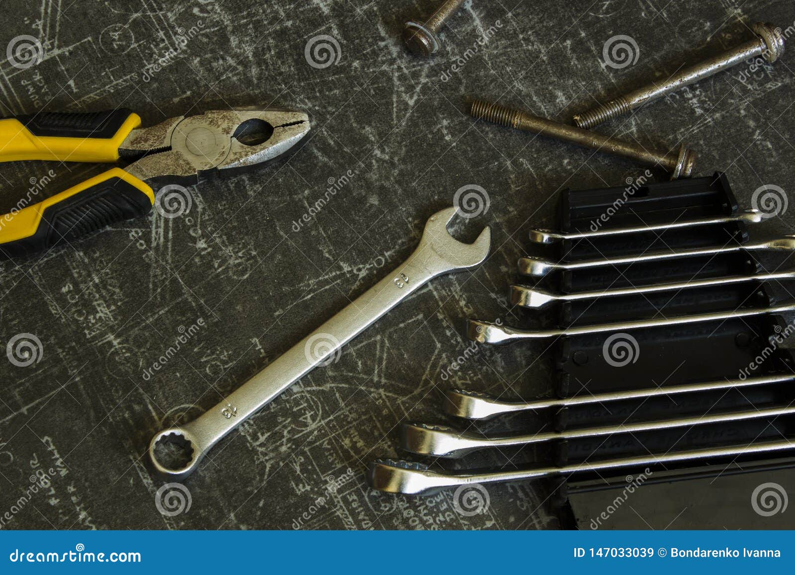 Tool Set of Pliers, Wrenches, Bolts and Nuts on Abstract Grey Surface Stock Image Image of