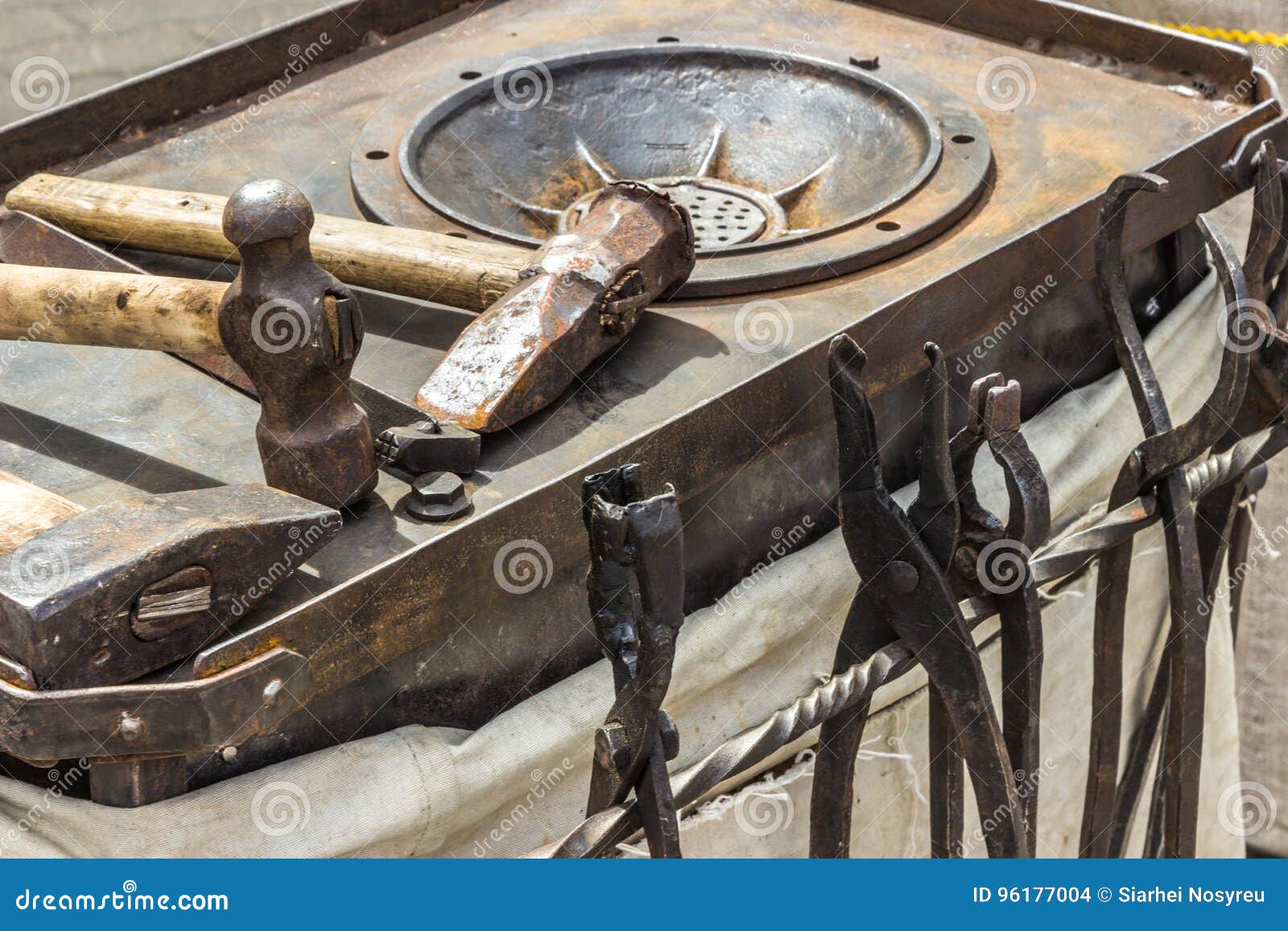 tools: hammer, tongs. equipment for coinage