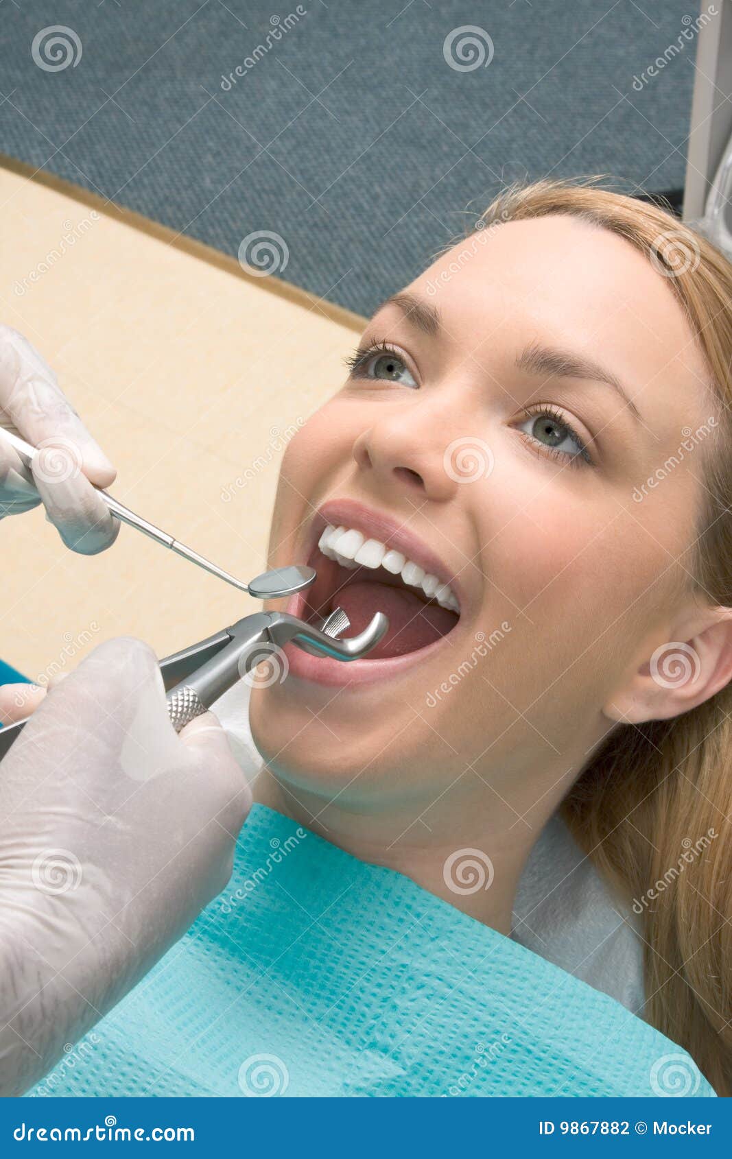 tooth extraction by dentist using forceps