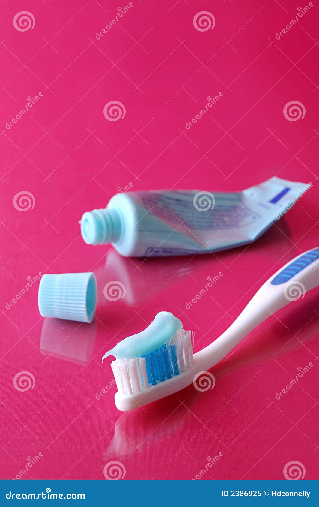 Toothbrush and toothpaste stock image. Image of glass 2386925