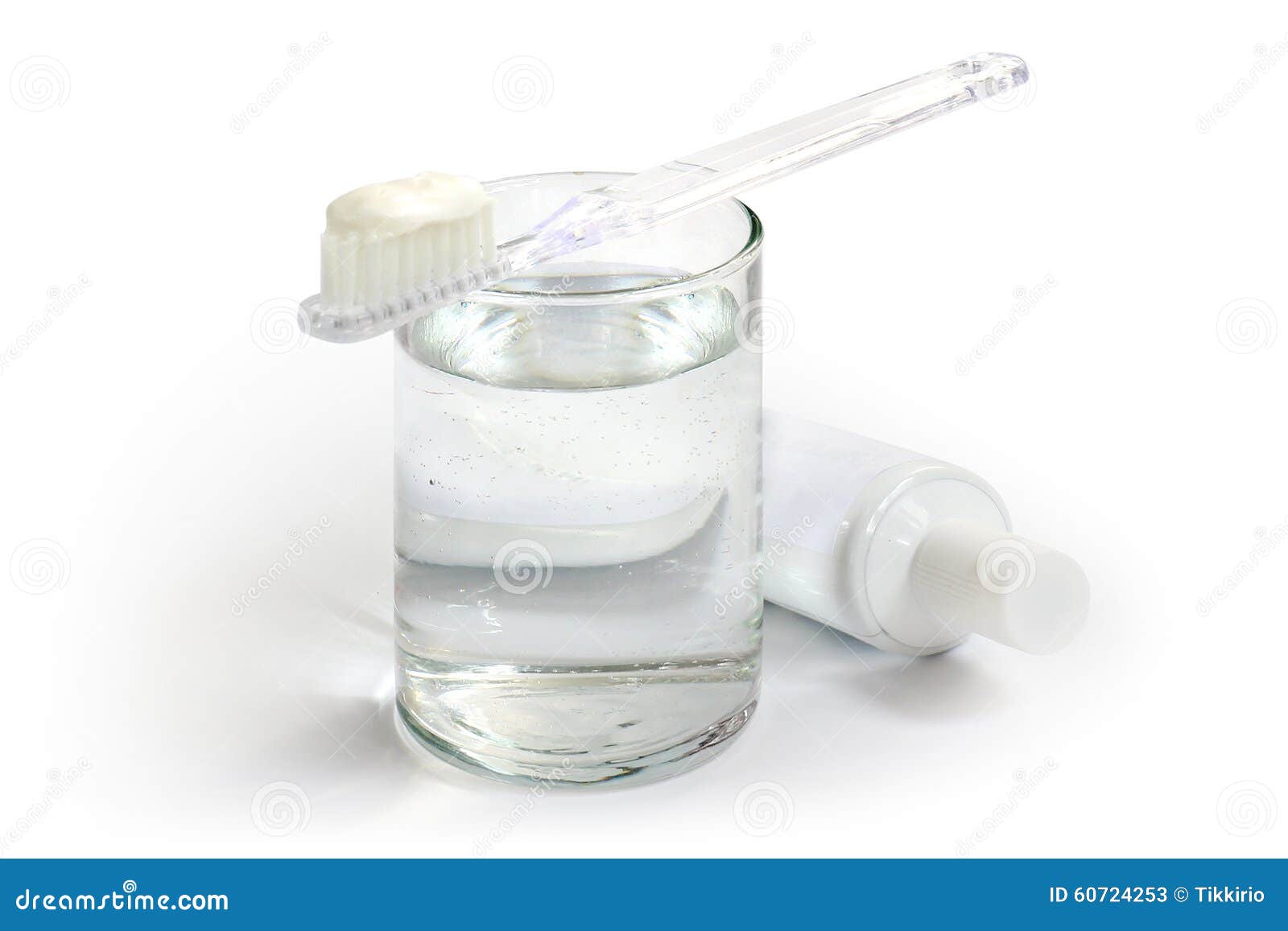 Toothbrush, Toothpaste and a Glass of Water. Stock Image Image of