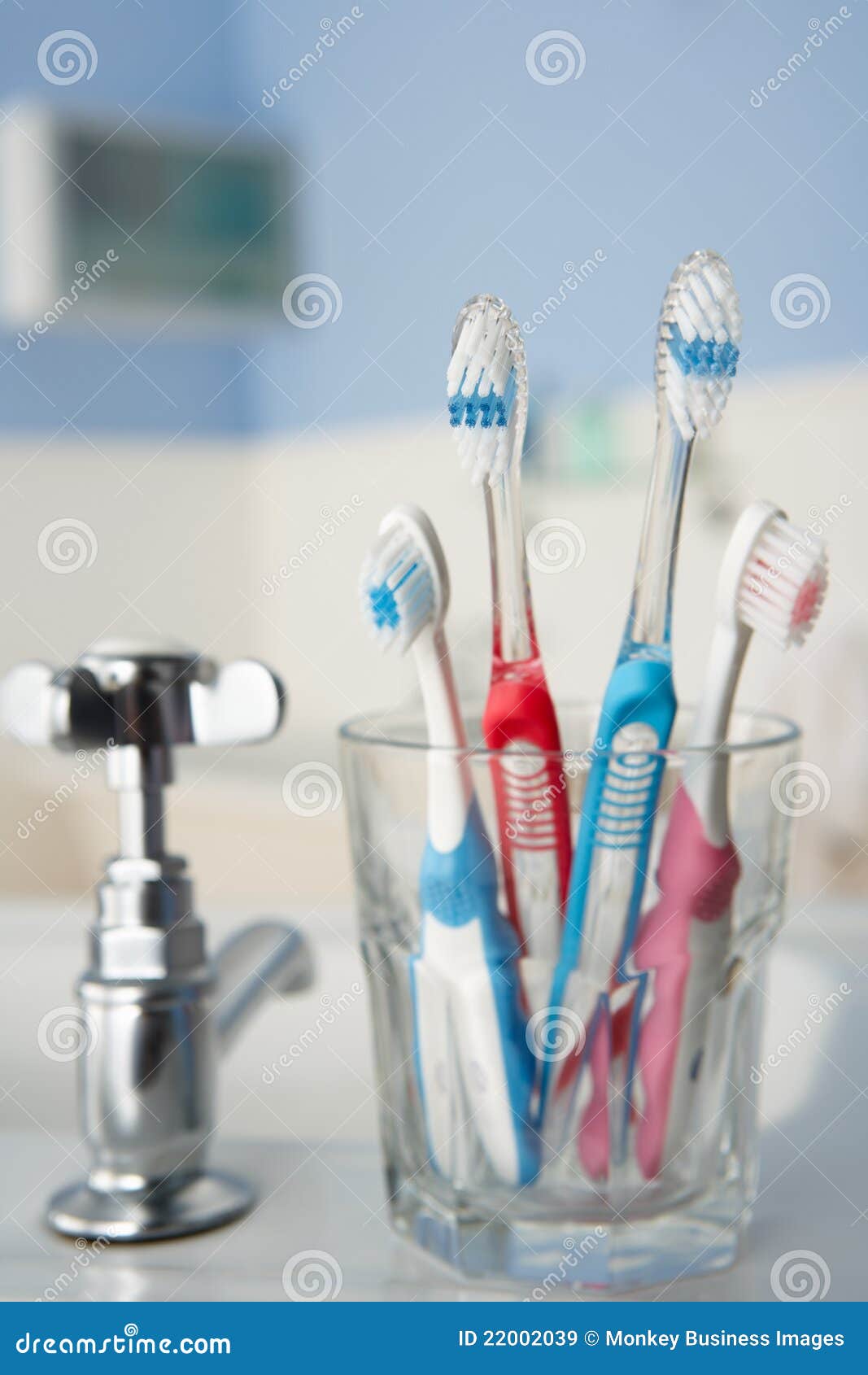 Toothbrushes in bathroom stock image. Image of sink, blue 22002039
