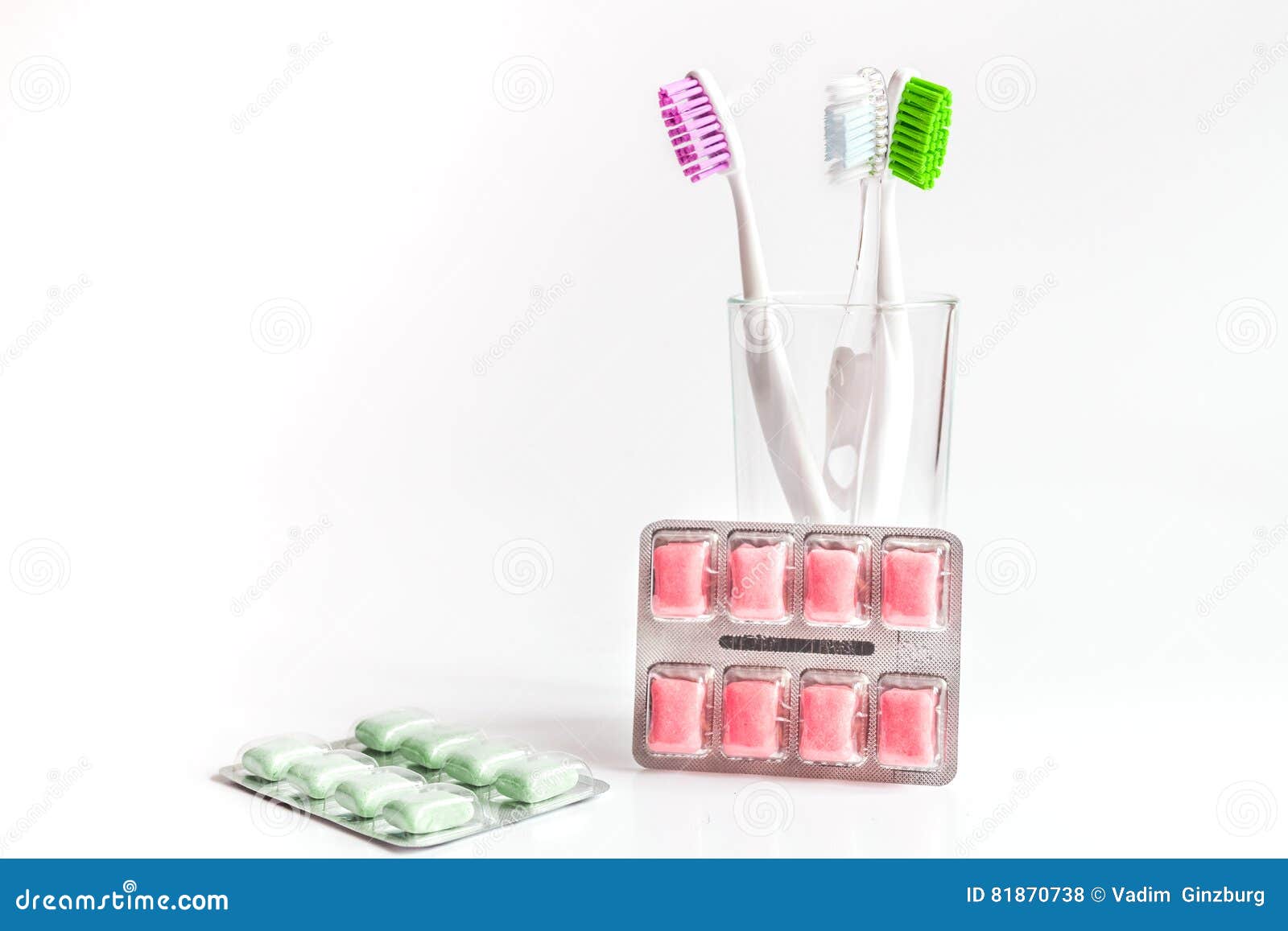 Toothbrushes in Glass on White Background Tools for Oral Care Stock