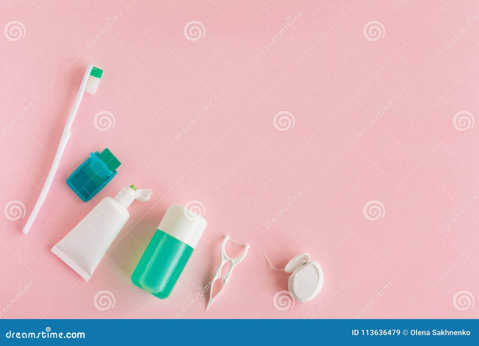 Toothbrushes, Toothpaste, Rinse and Chewing Gum Set on Pink Background