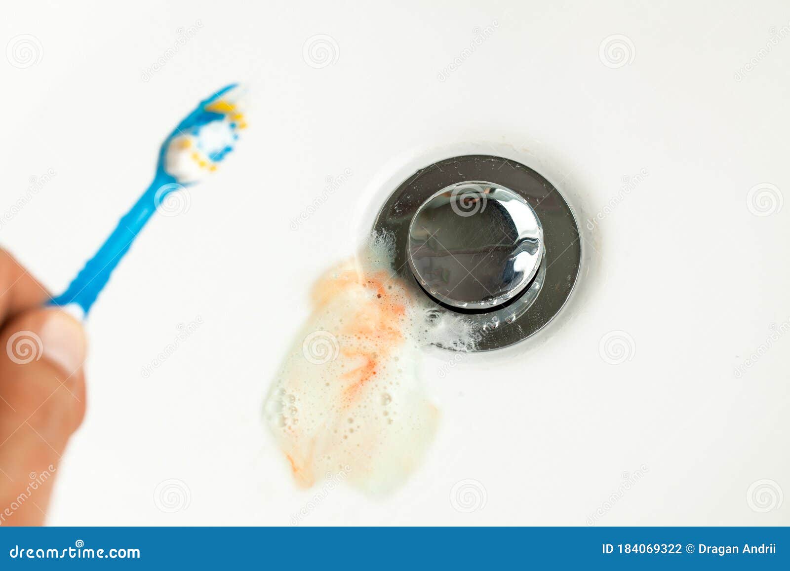 Toothpaste with Blood in the Sink after Brushing Your Teeth. Bleeding