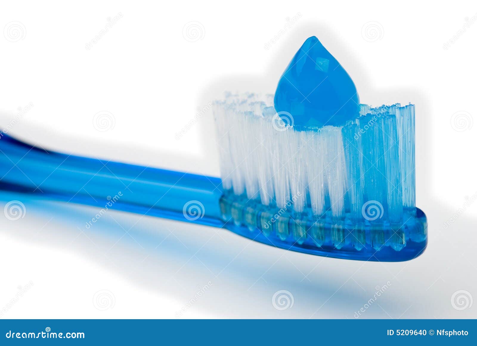 Toothpaste on Blue Toothbrush, on White Stock Photo Image of care