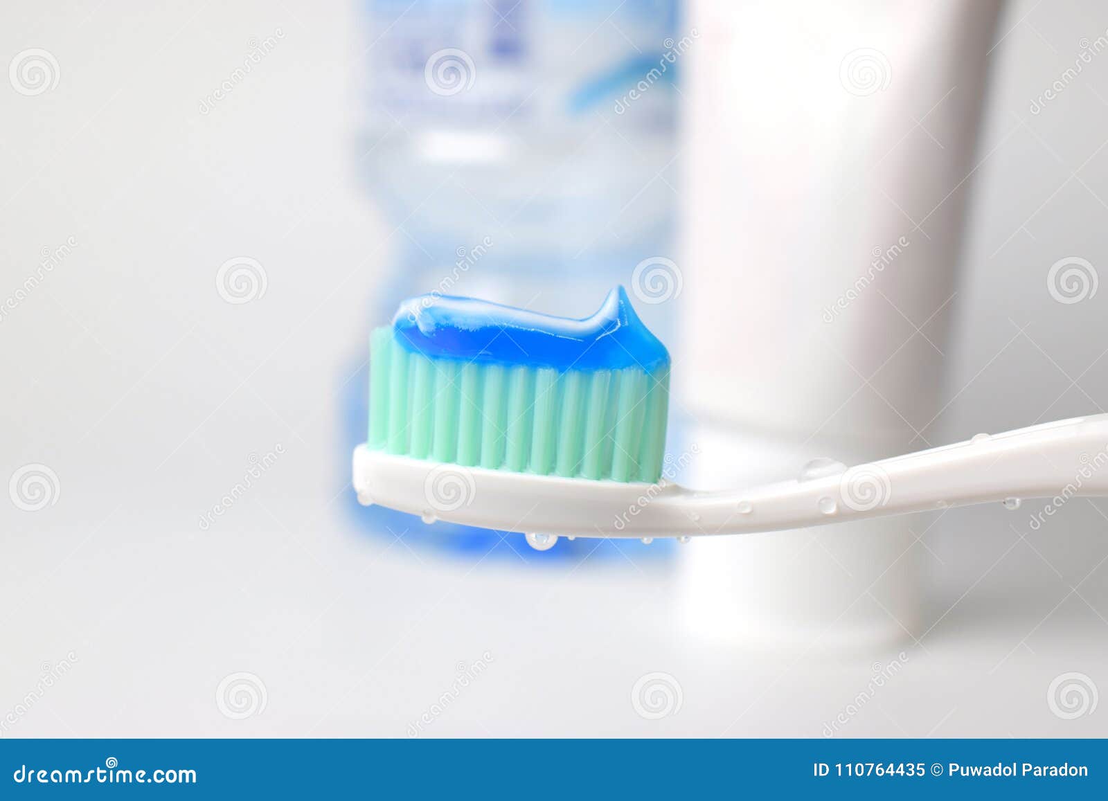 Toothpaste on a Toothbrush with Water Drop Stock Image Image of water