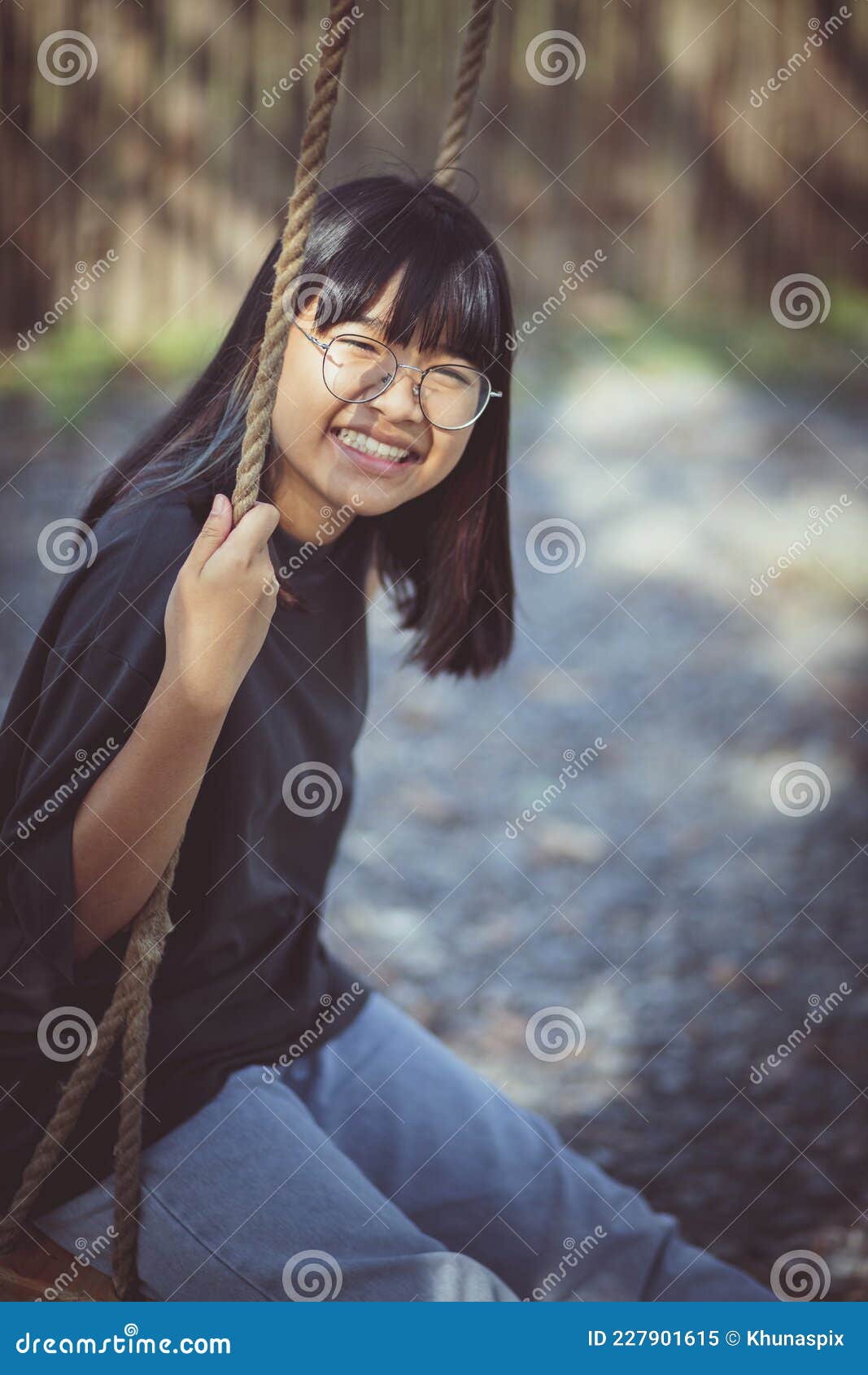 Toothy Smiling Face Of Asian Teenager Relaxing In Public Park Stock Image Image Of Cheerful