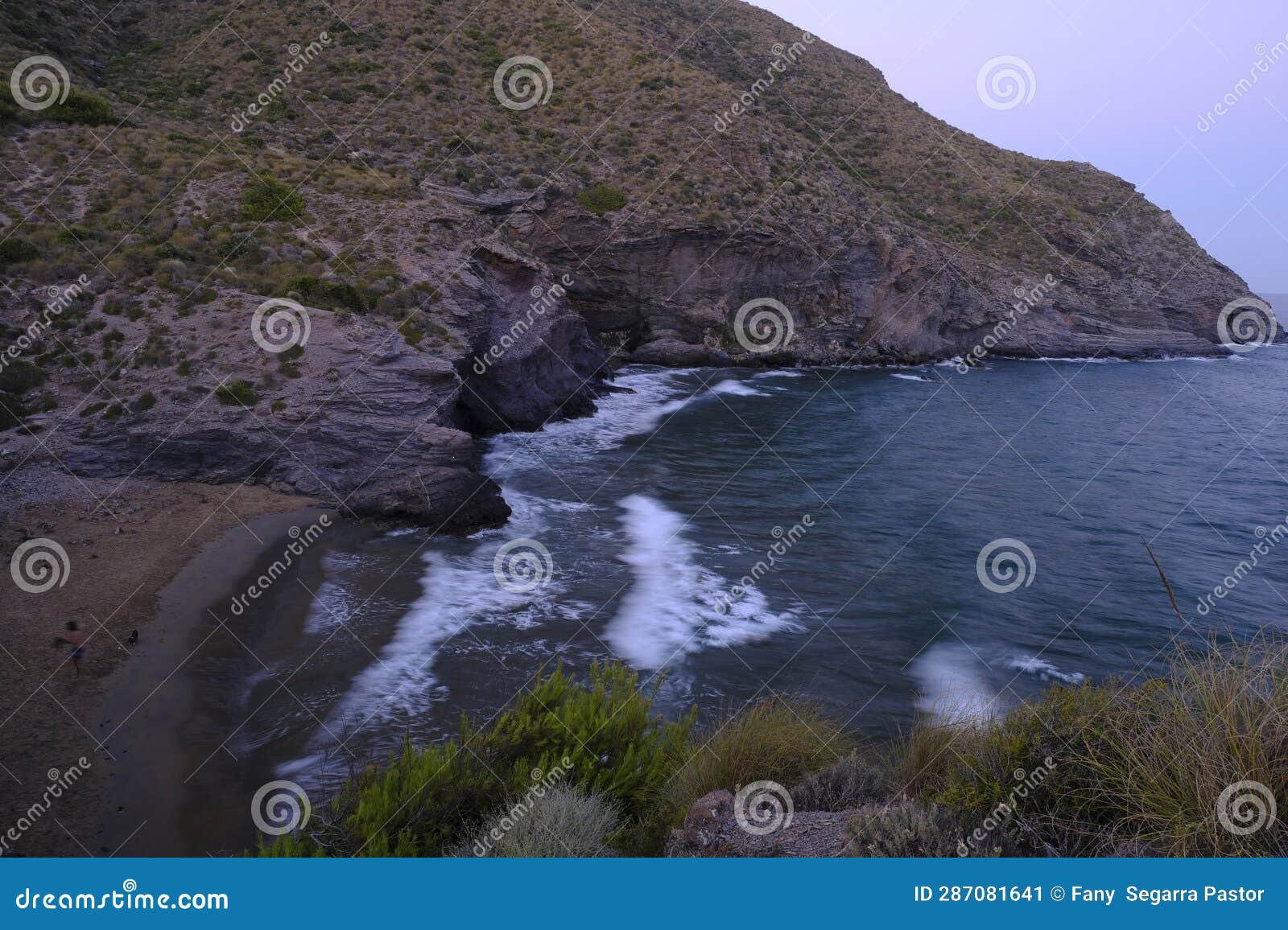 from the top of the cliff, we observe the cala de cabo de palos