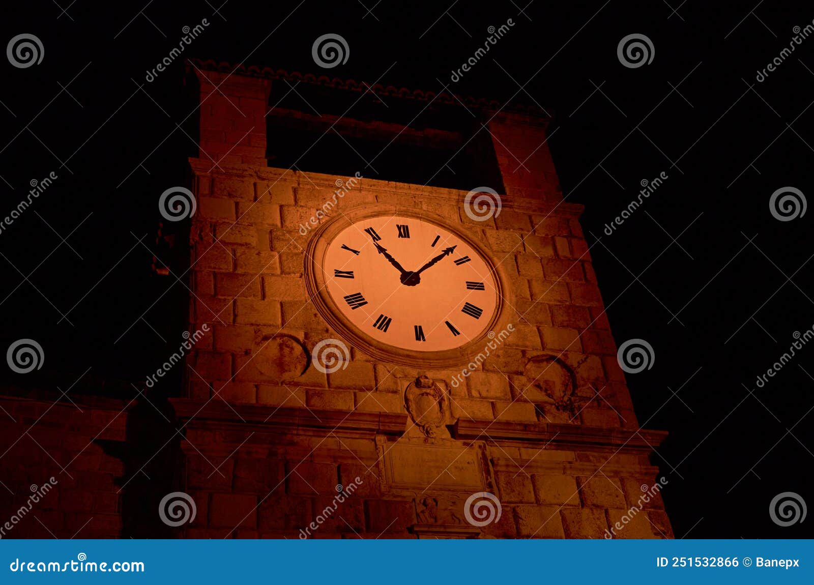 Clocktower in the night stock photo. Image of hour 251532866