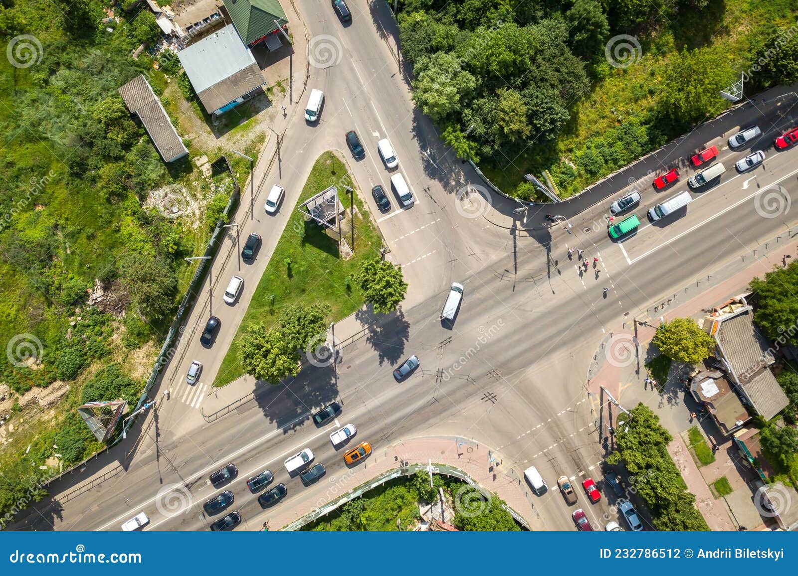 Top Down Aerial View of Busy Street Intersection with Moving Cars ...