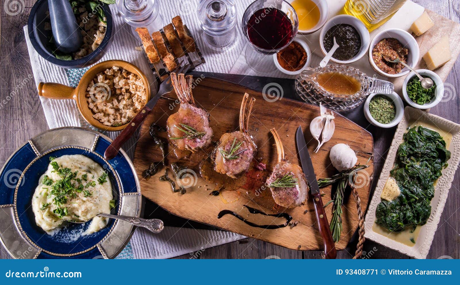 top down view of a minted rack of lamb with spinach and mashed potatoes