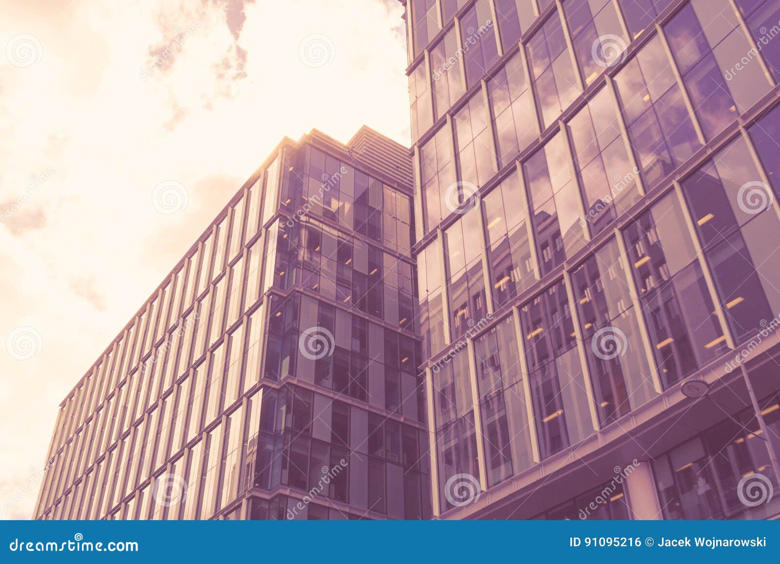 Top of Glass Buildings with Clouds Haze Split Toning Stock Photo