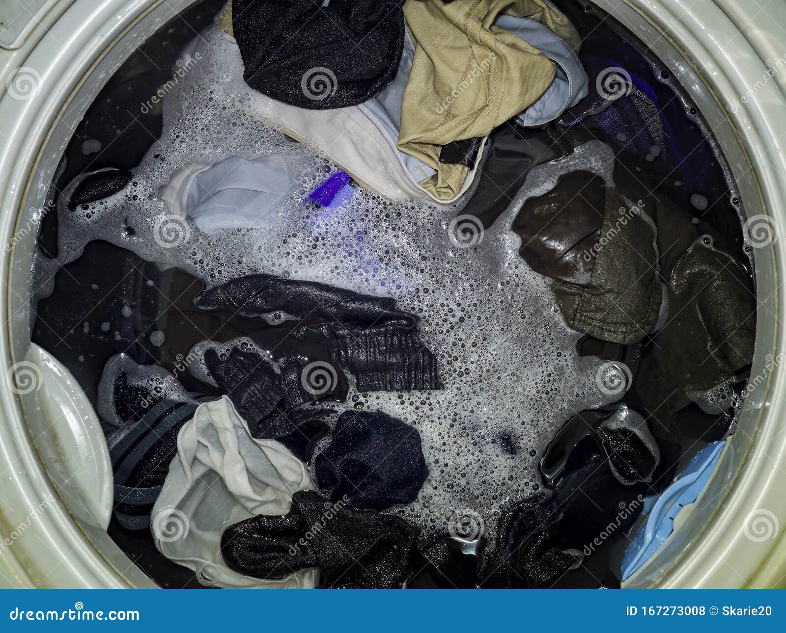 Top Loading Washing Machine Washes Laundry Internal View Of A Washing Machine Drum During Wash Top View Stock Photo Image Of Load Bubble 167273008