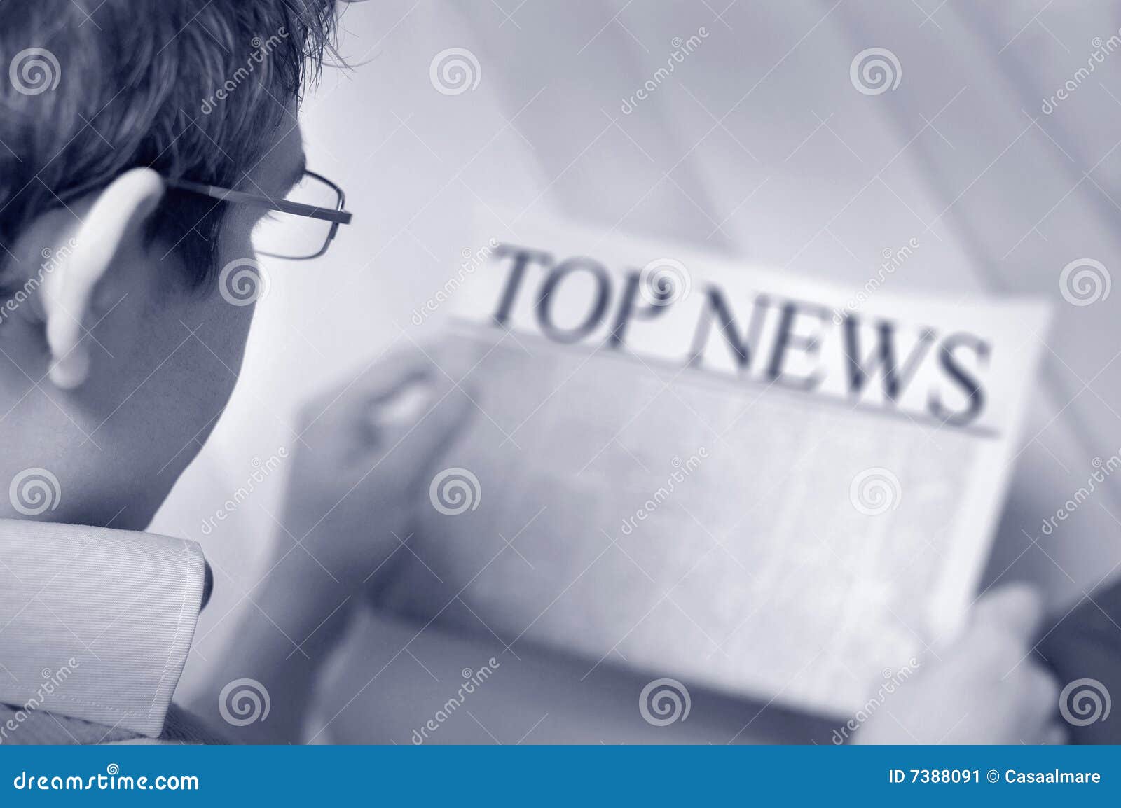 Top news. Businessman reading a top business news