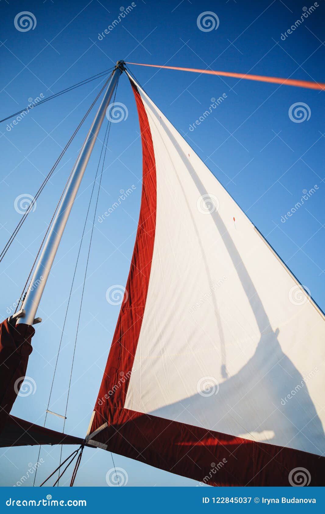 top of the sailboat, mast head, sail and nautical rope yacht detail. yachting, marine background